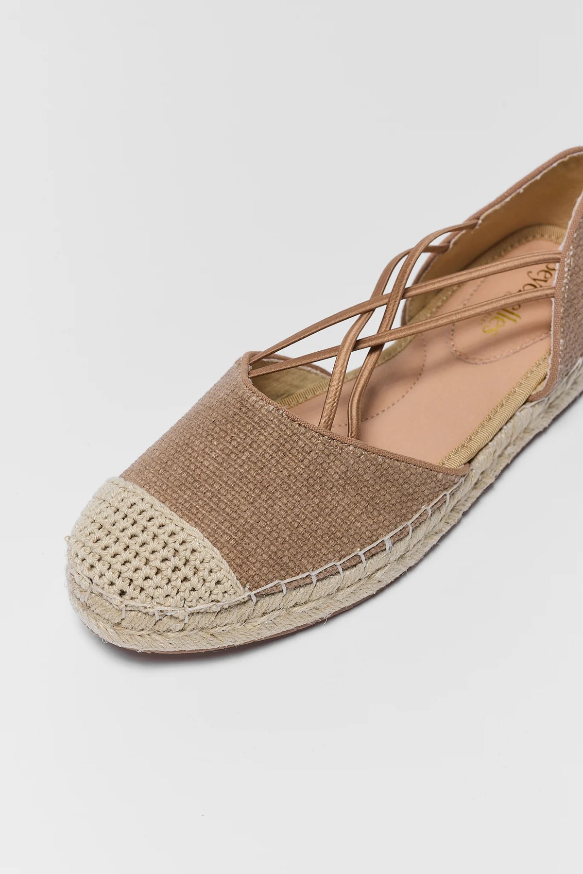 Close-up of tan espadrille toe cap with crochet detail and woven jute sole - Toe Detail | Avara