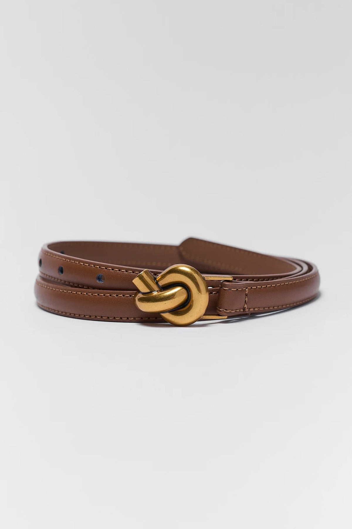 Brown faux leather skinny knot belt with gold-tone buckle, coiled - brown skinny belt women | Avara