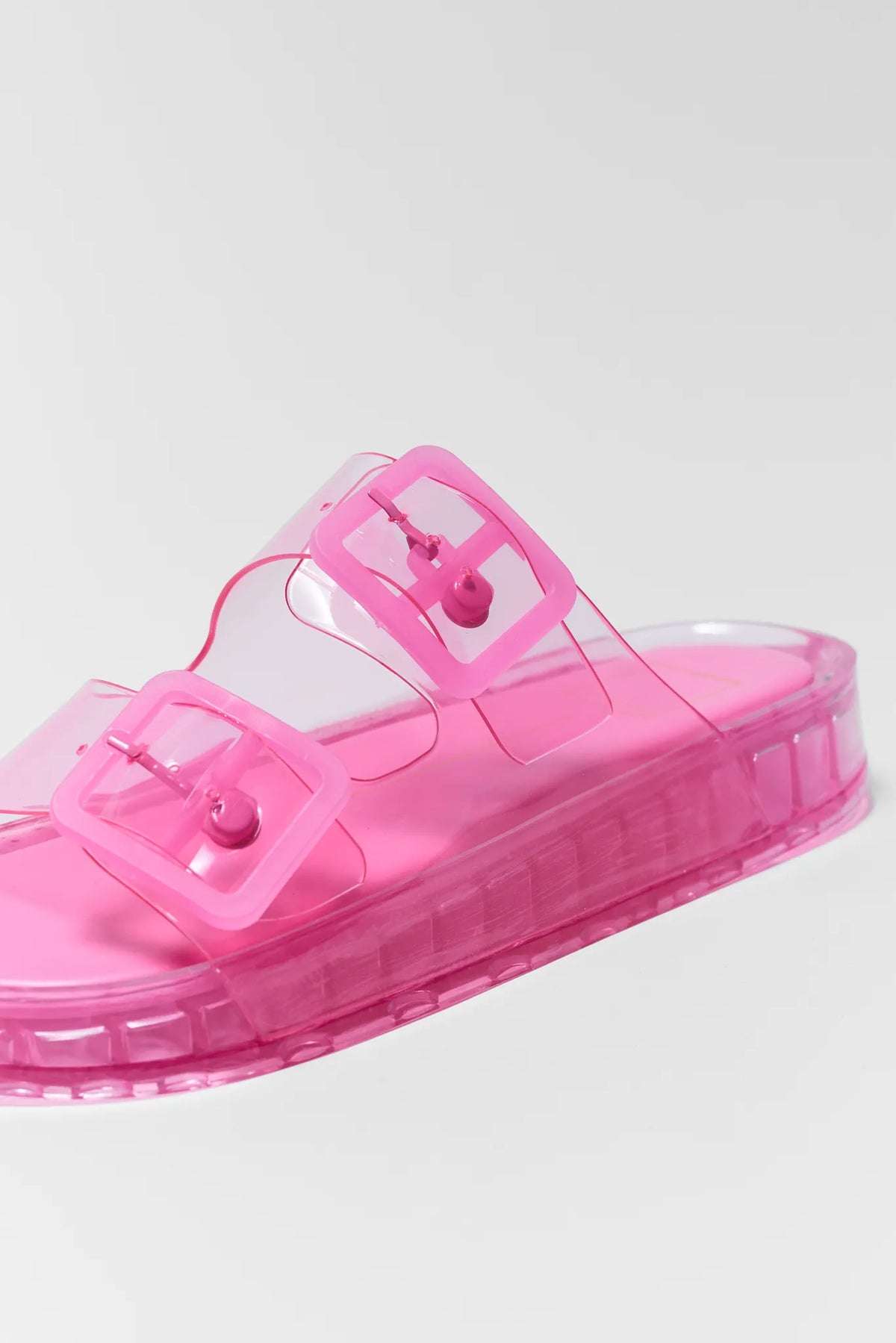 Dolce Vita Julio pink jelly sandal double buckle strap and chunky clear platform sole - Close-Up Detail | Avara