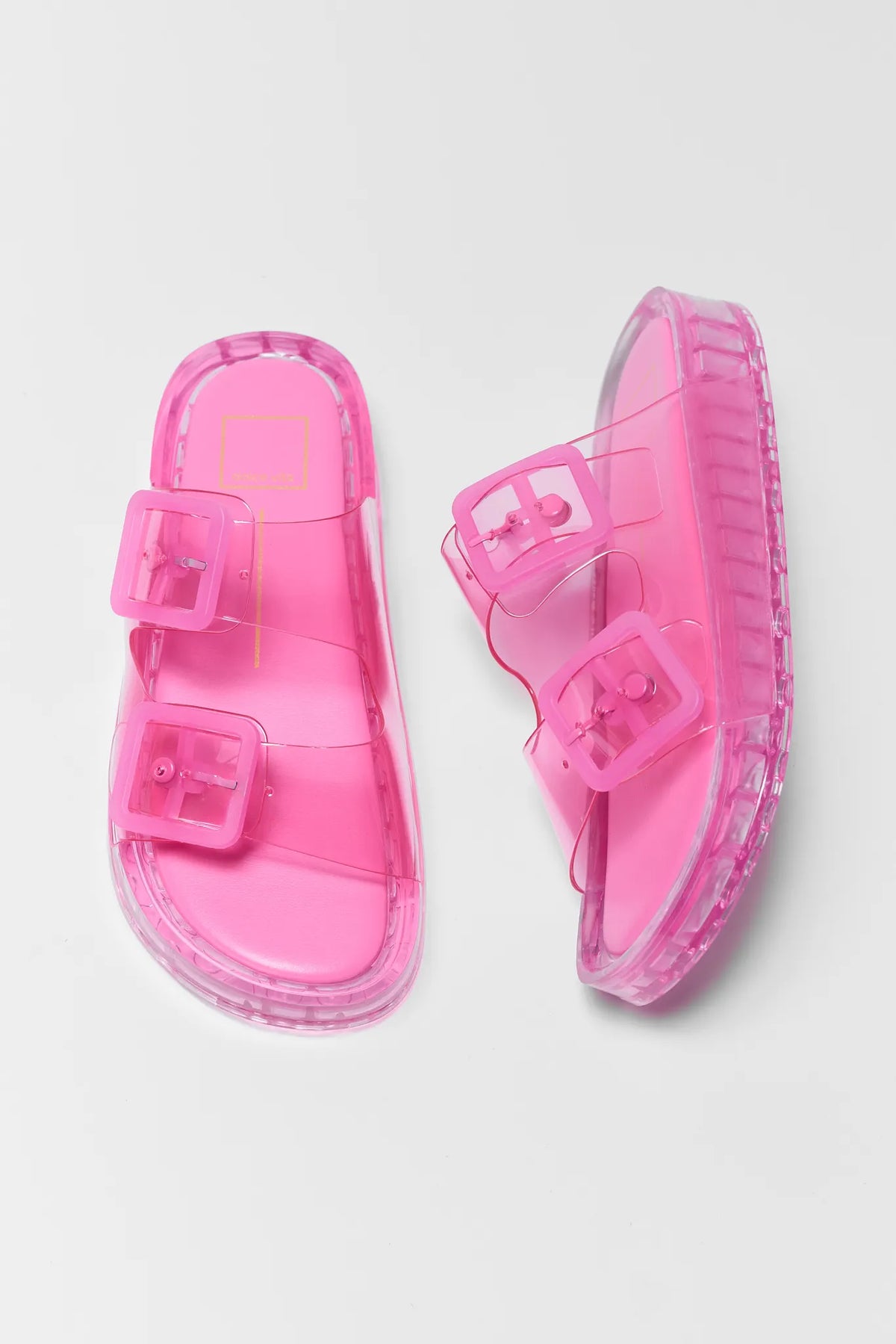 Hot pink jelly sandals with double square buckle straps and clear platform sole - Top View, Pair | Avara