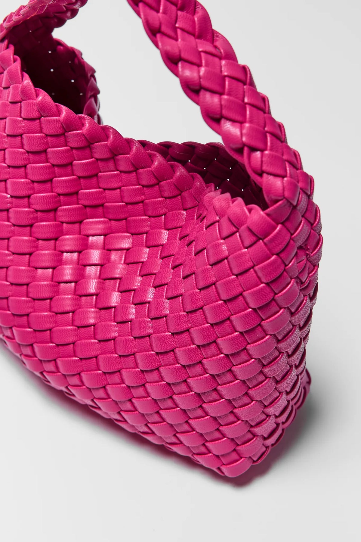 Hot pink woven faux leather bag - Close-Up Texture Detail | Avara