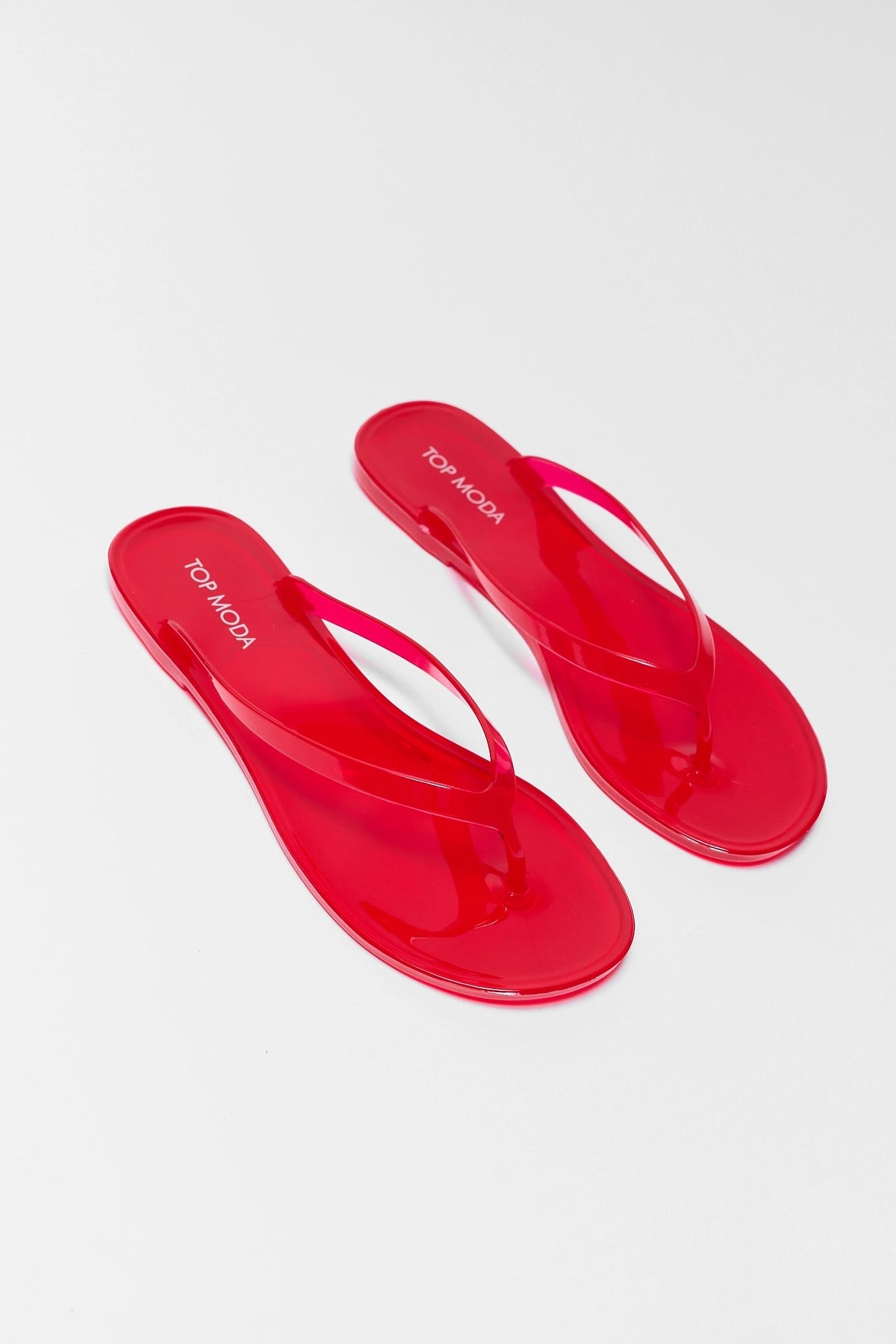 Red Jelly Flip Flop Sandals Womens - Angled Pair View Showing Footbed | Avara