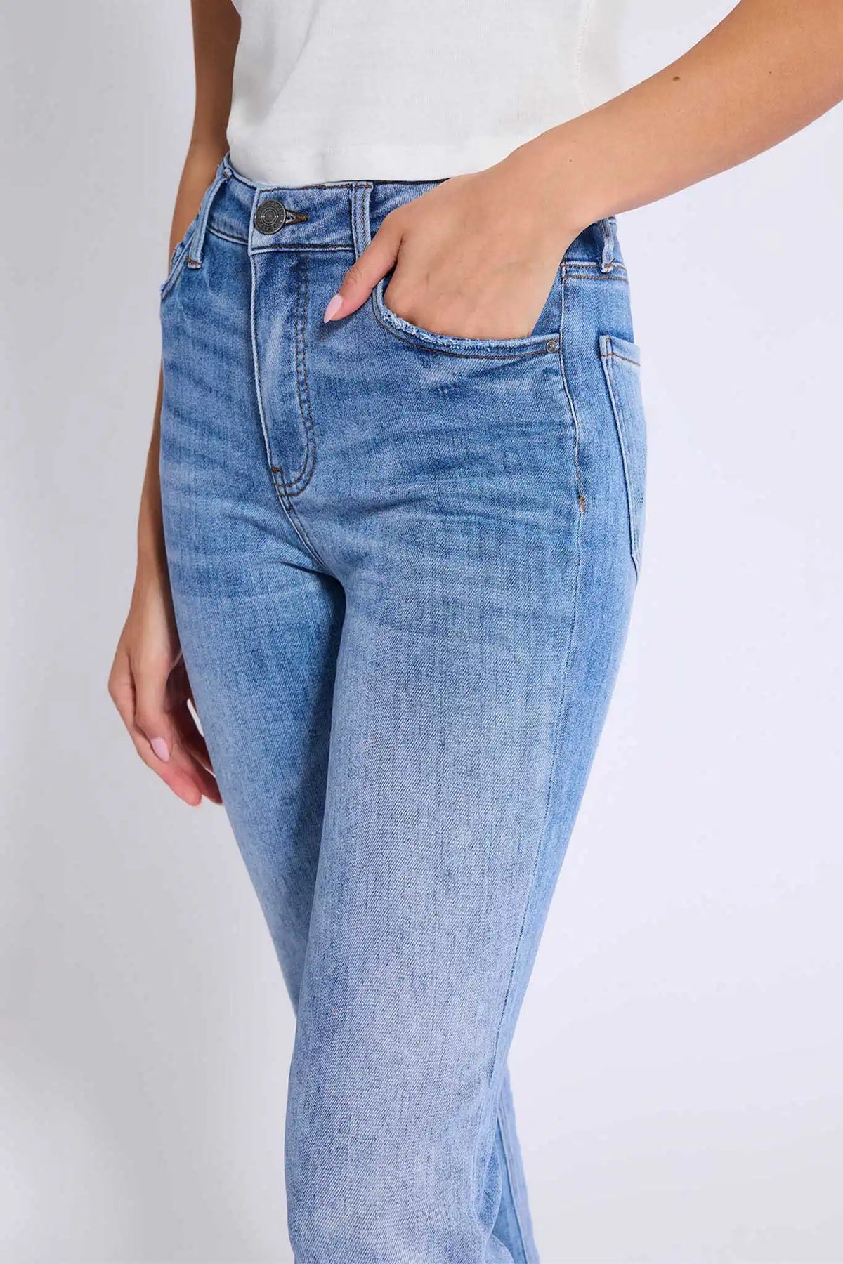 Kelsey Medium Wash Kick Flare Jeans - Waist & Pocket Close-Up, high-rise five-pocket denim detail | Avara