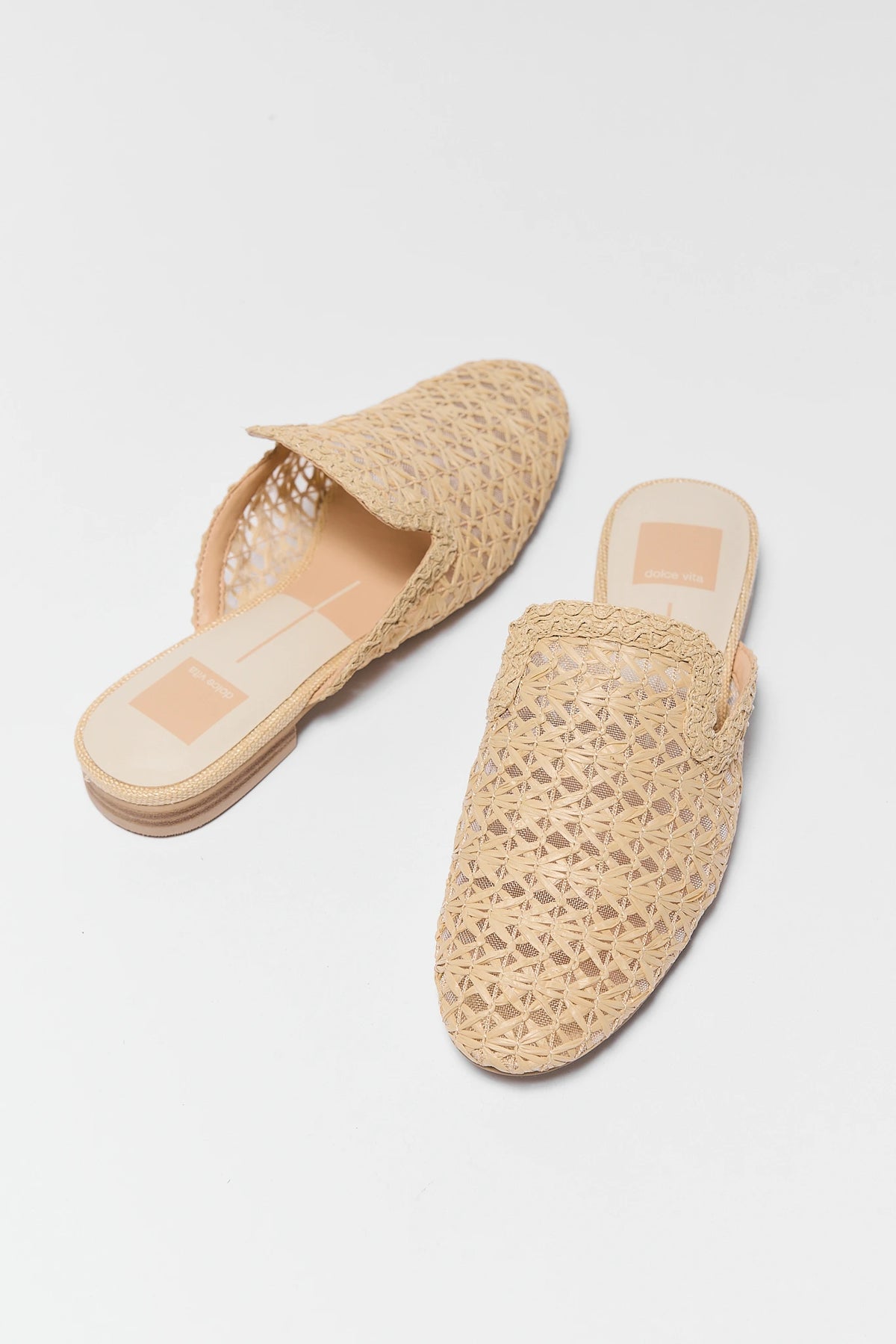 Tan woven raffia mules pair flat lay angled view - Dolce Vita Kirt | Avara