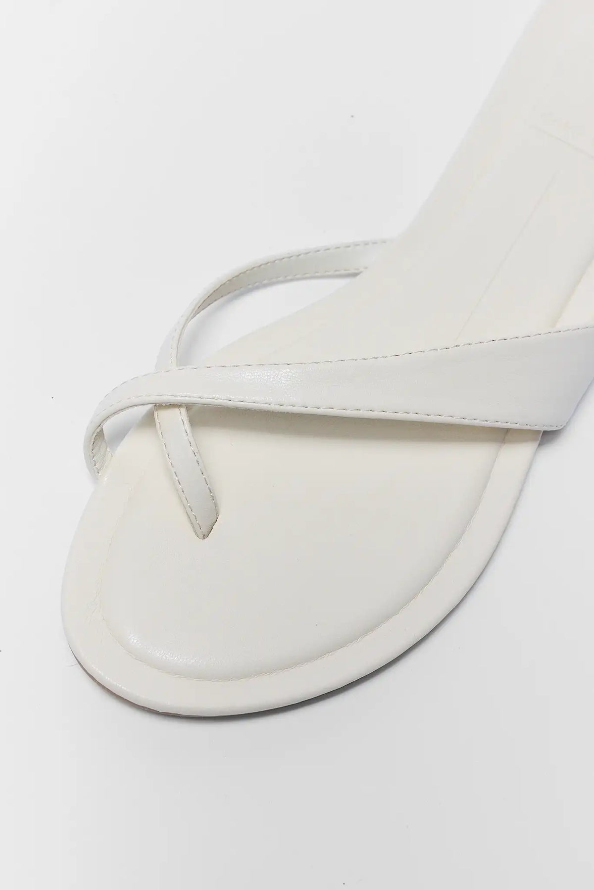 White sandal close-up strap detail, crossover toe loop - Dolce Vita Lenex | Avara