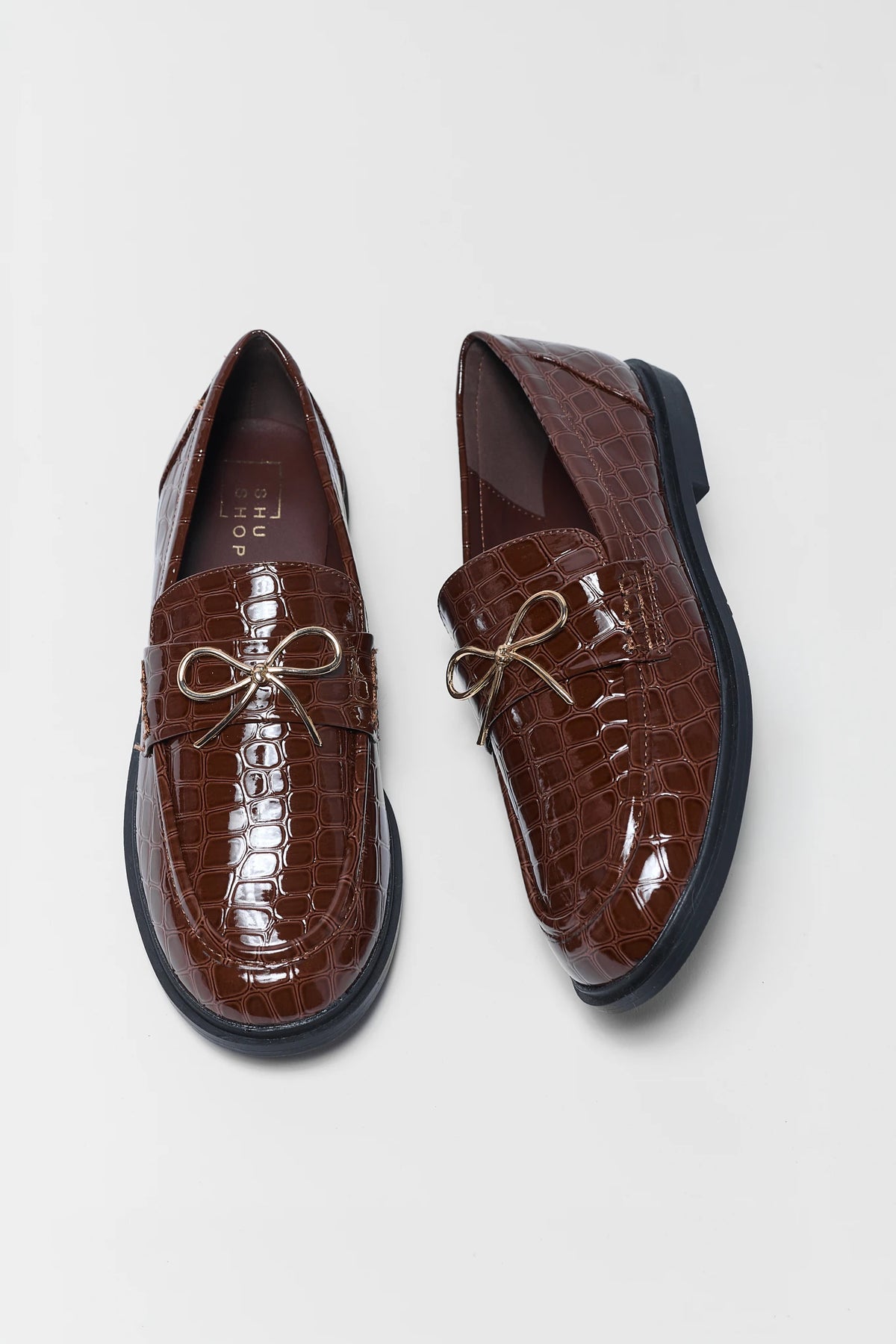 Brown Croc-Embossed Faux Leather Loafers - Top Down View | Avara