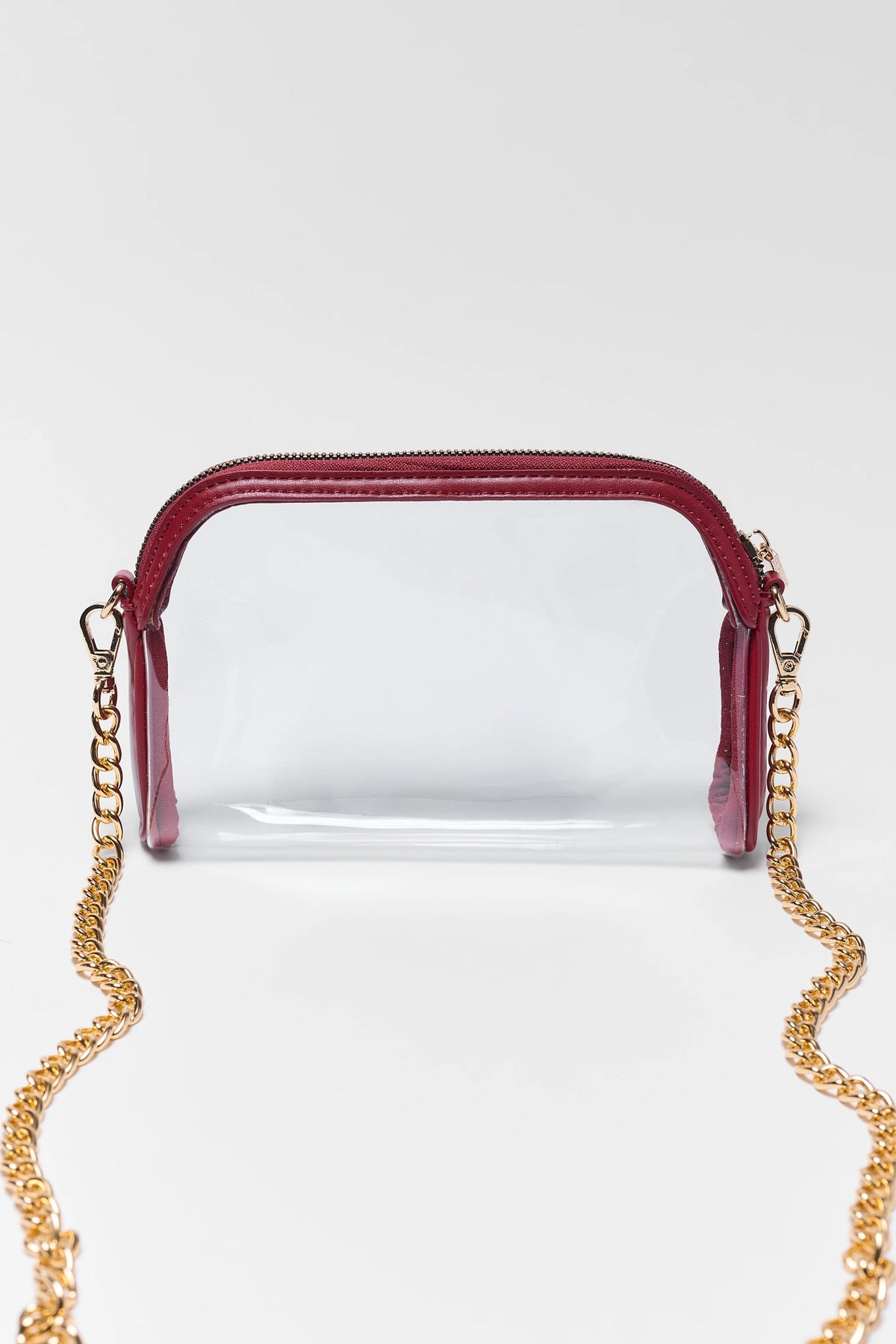 Maroon trim clear crossbody bag with gold chain strap - Front View | Avara