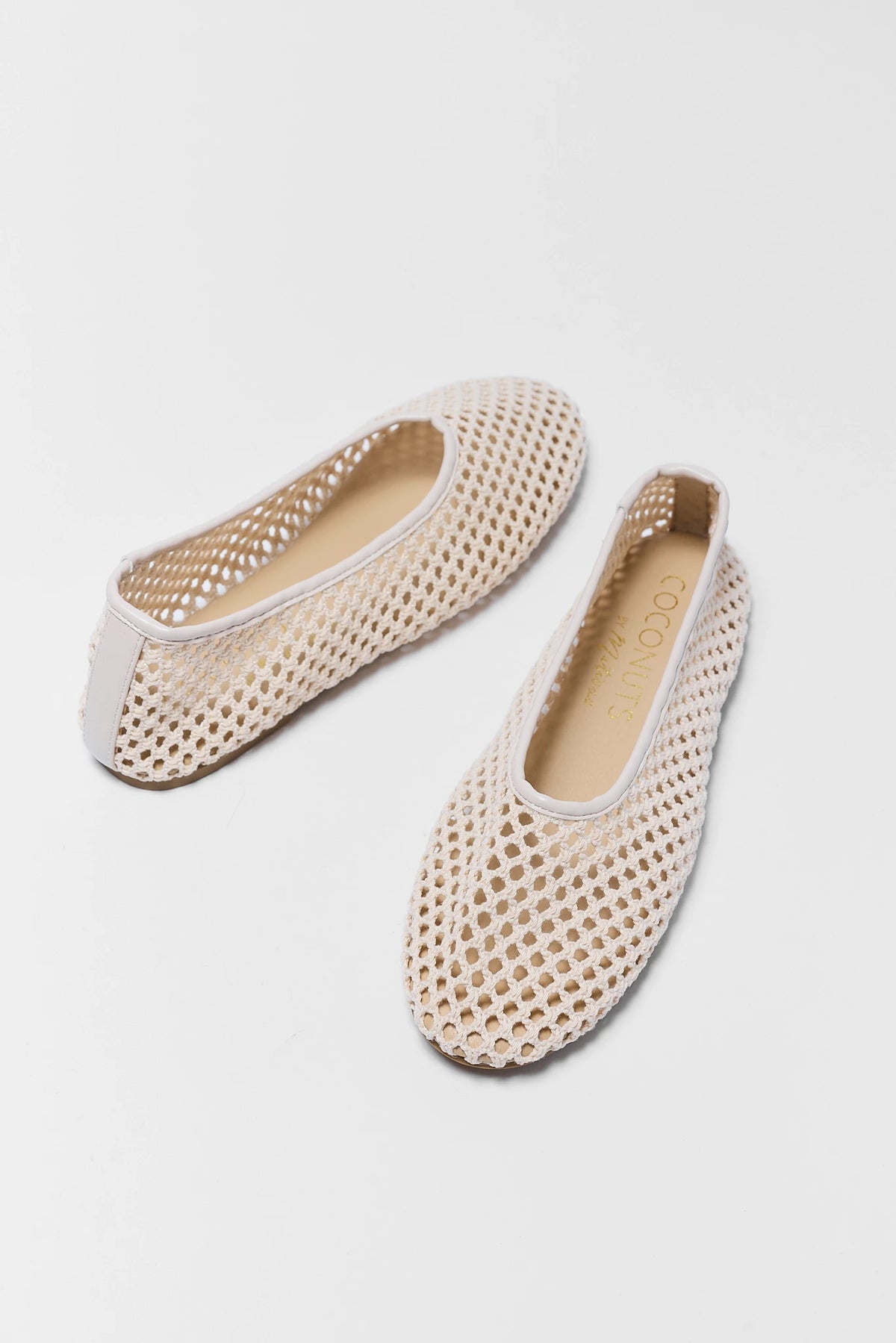 Pair of cream woven flats angled top view showing open mesh detail and tan footbed - Matisse Marta | Avara