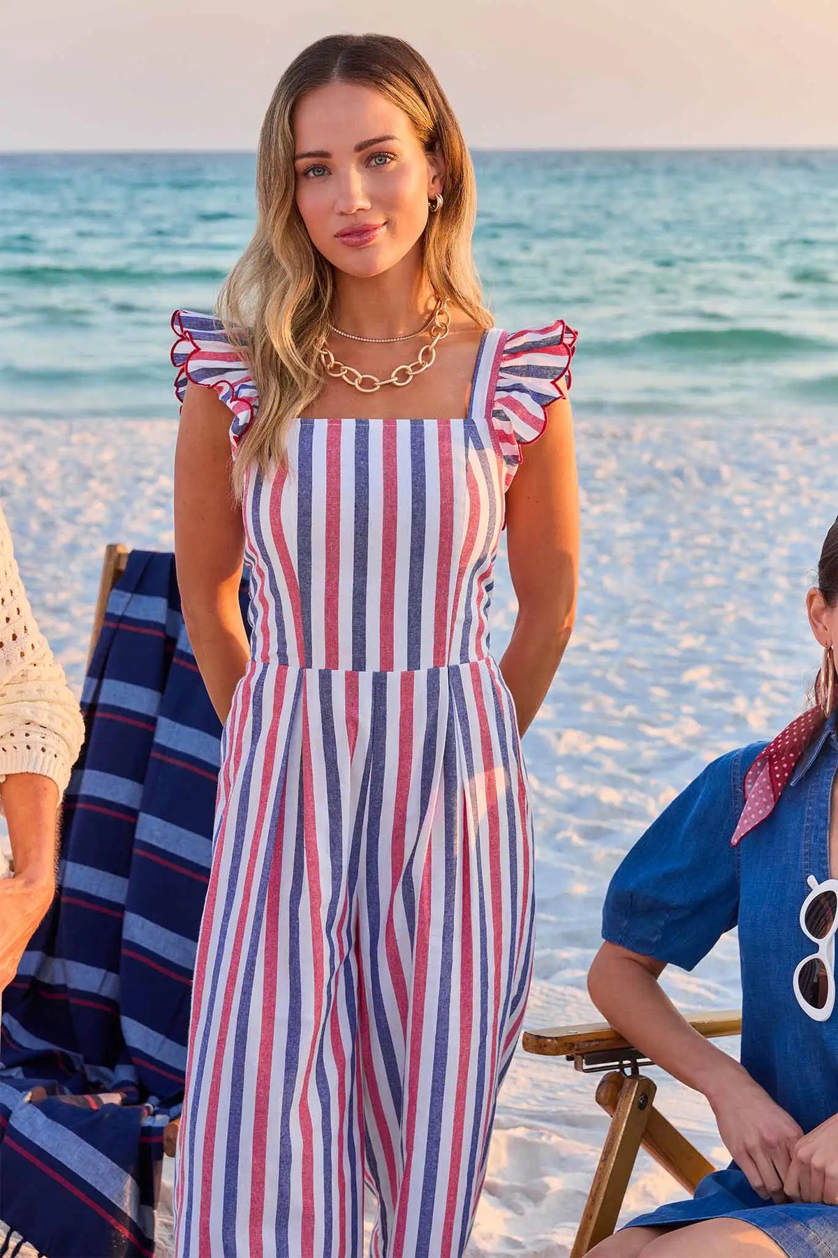 Red white blue striped flutter sleeve jumpsuit - Beach Lifestyle Shot | Avara