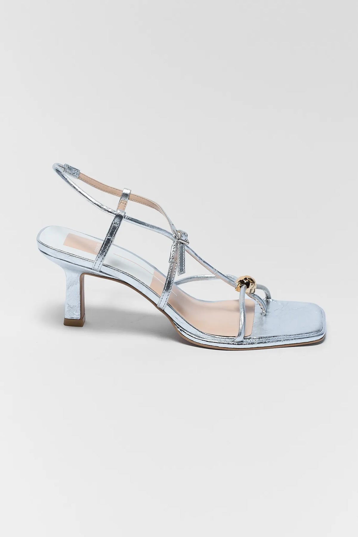 Mylee Silver Strappy Kitten Heel Sandal by Dolce Vita - Side Profile with Ankle Strap | Avara