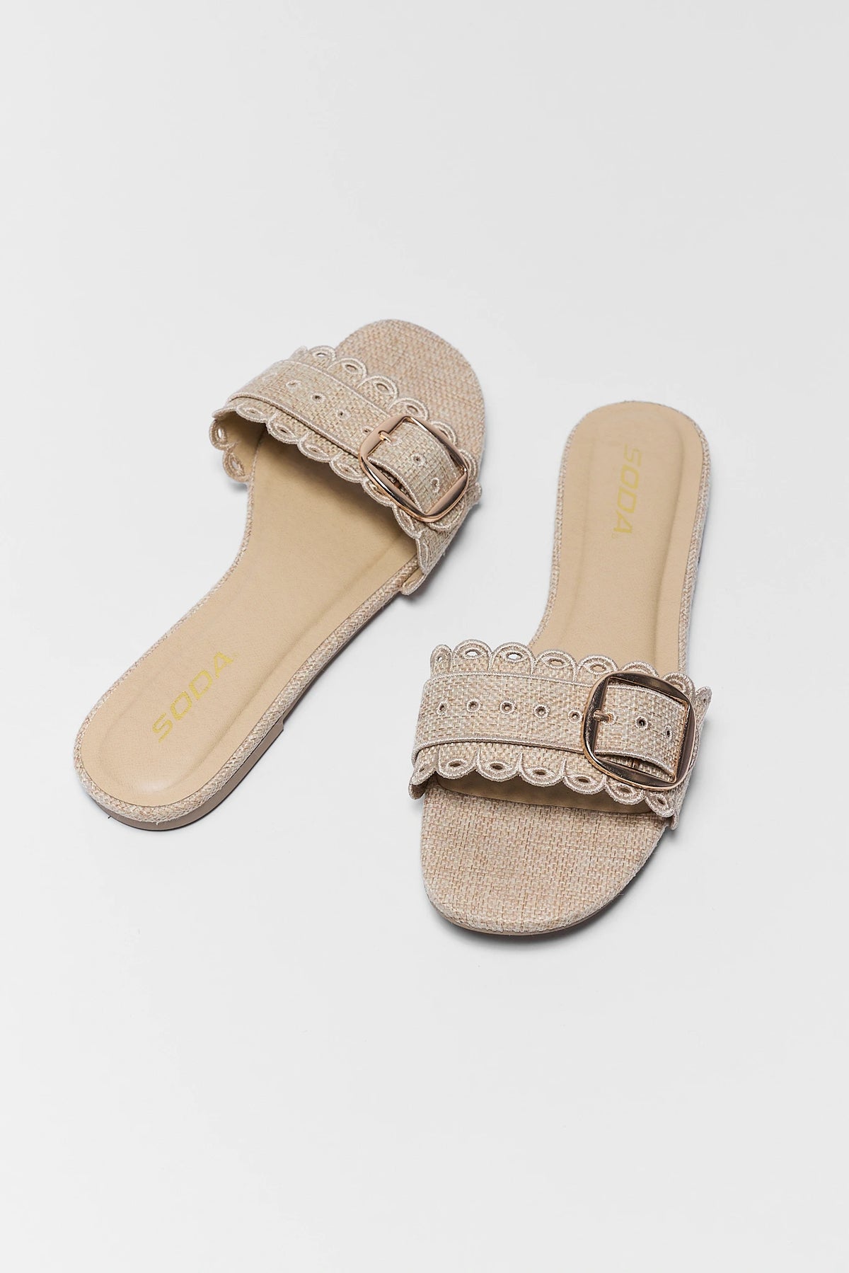 Nancy Tan Scalloped Buckle Sandals - Angled Pair View, Woven Raffia Flat Slide | Avara