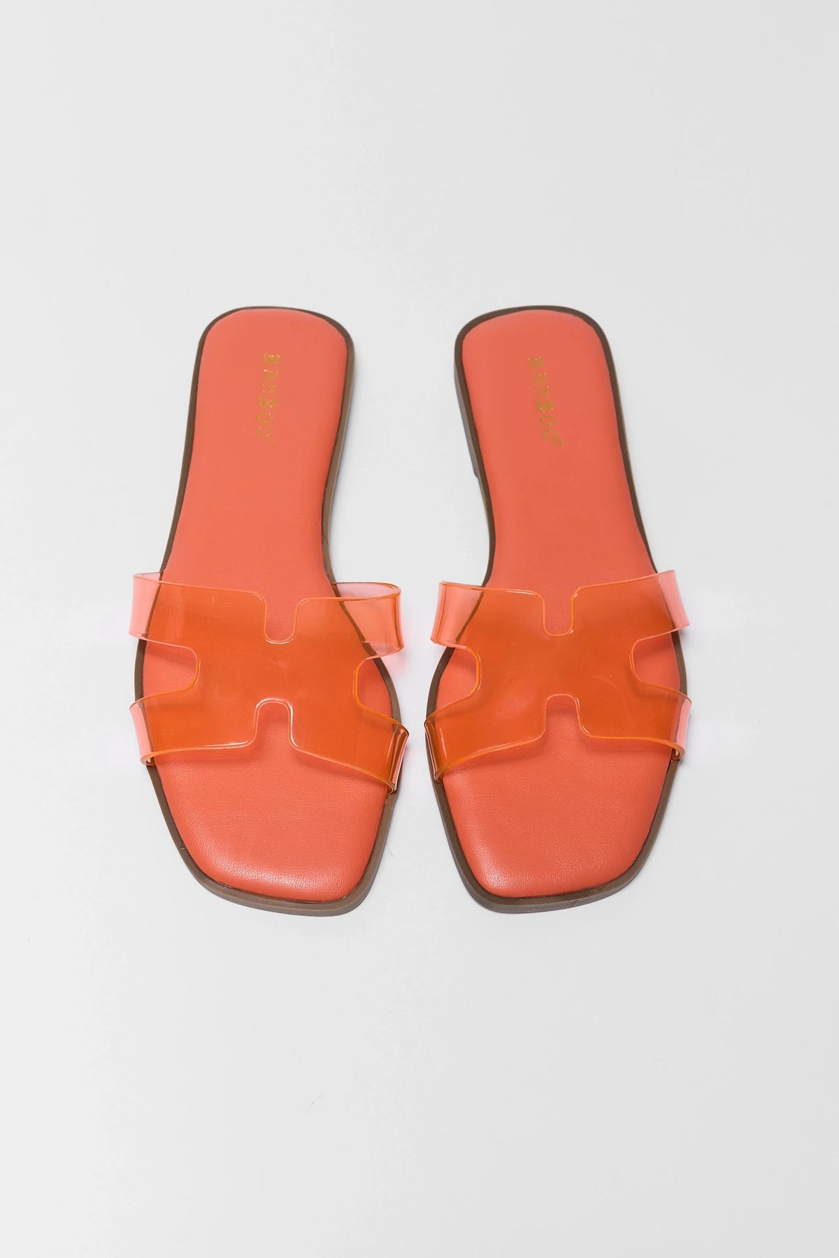 Orange jelly sandals with clear H-strap detail and square toe - Top-Down Flat Lay | Avara