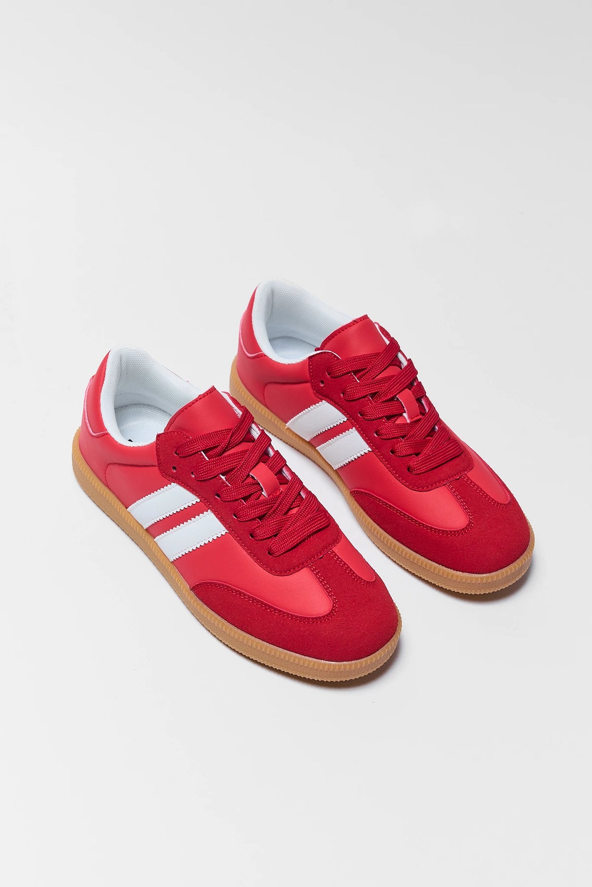 Red Low-Top Sneakers - Pair Flat Lay, White Contrast Stripe Game Day Shoes | Avara