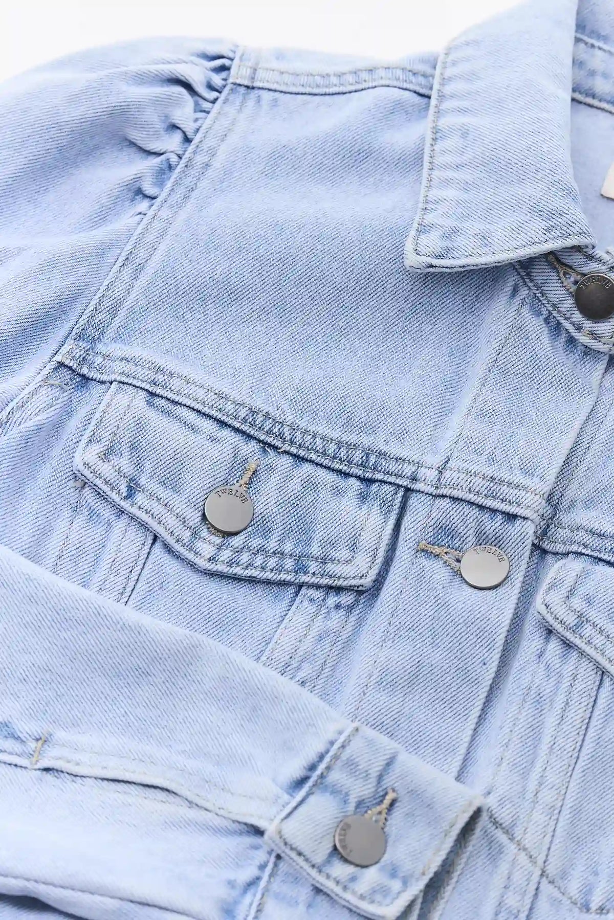 Roxanna Light Wash Denim Jacket - Silver Button & Chest Pocket Detail, Flat Lay | Avara