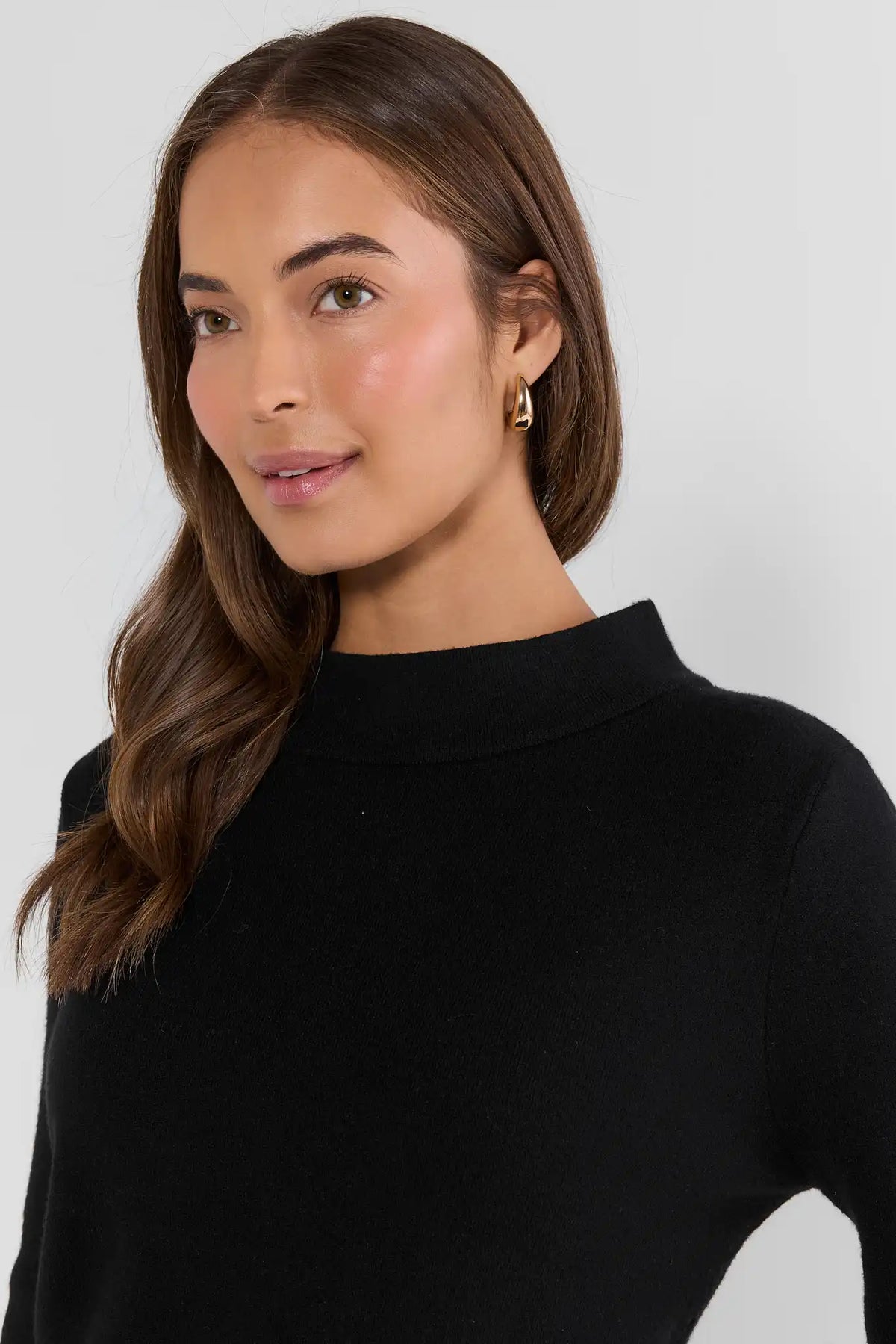 Jackie Black Knit Sweater - Mock Neck Close-Up on Model, Black Knitted Top | Avara