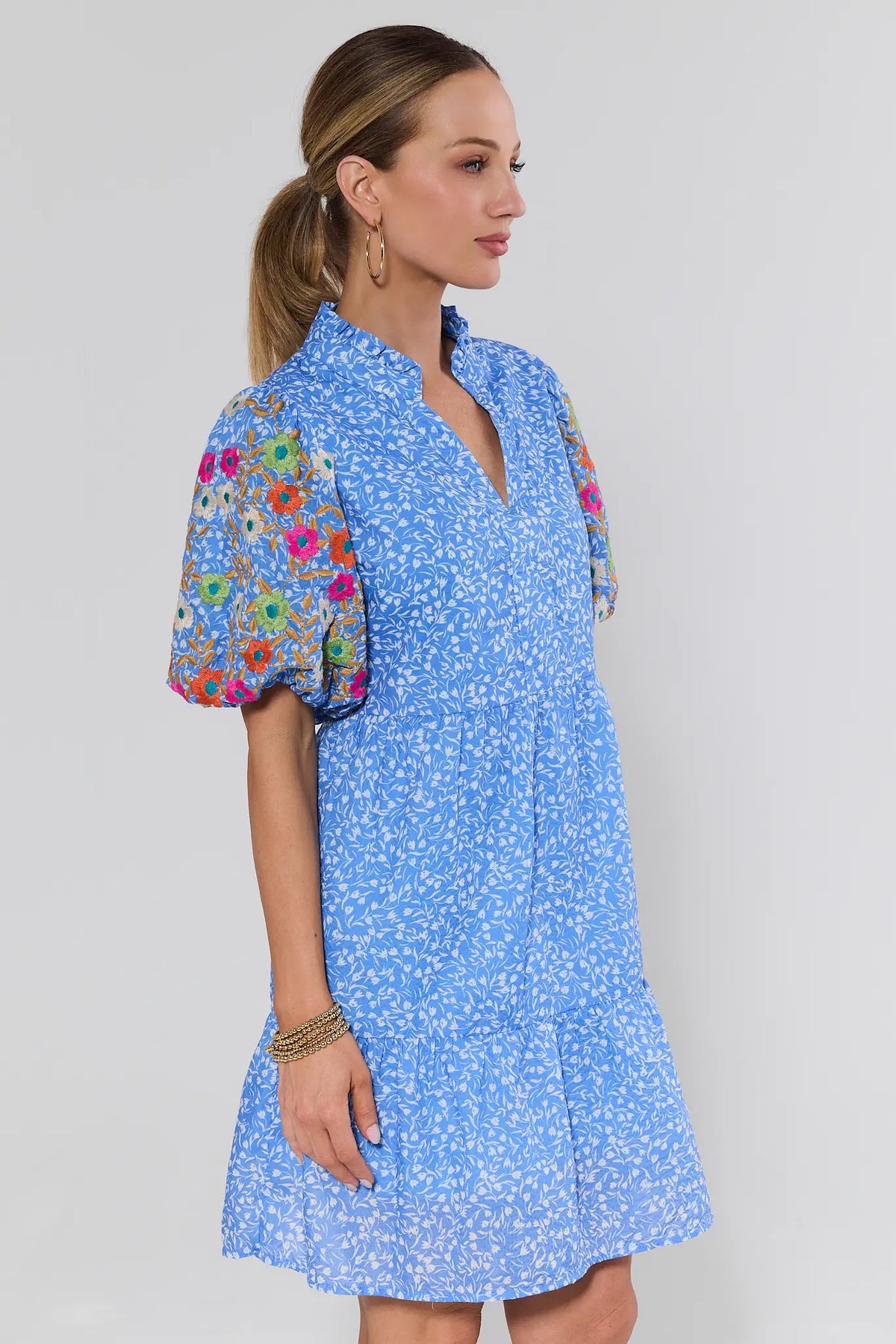 Sue Ann Blue Floral Short Dress by THML - side profile showing floral embroidered puff sleeves and tiered flounce hem | Avara