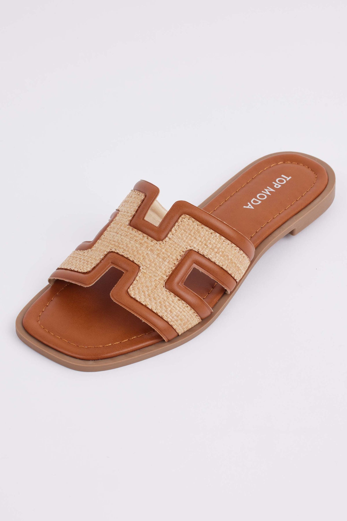 Tan Hensley Raffia Slide Sandal with faux leather strap detail - Side View | Avara