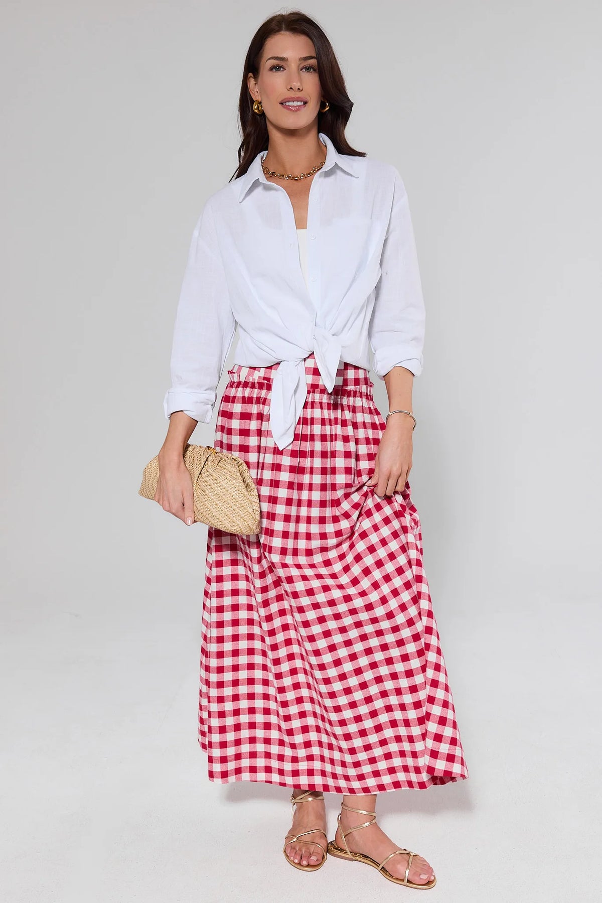 Allie Red Gingham Maxi Skirt styled with knotted white shirt and rattan clutch - Full Length Front | Avara