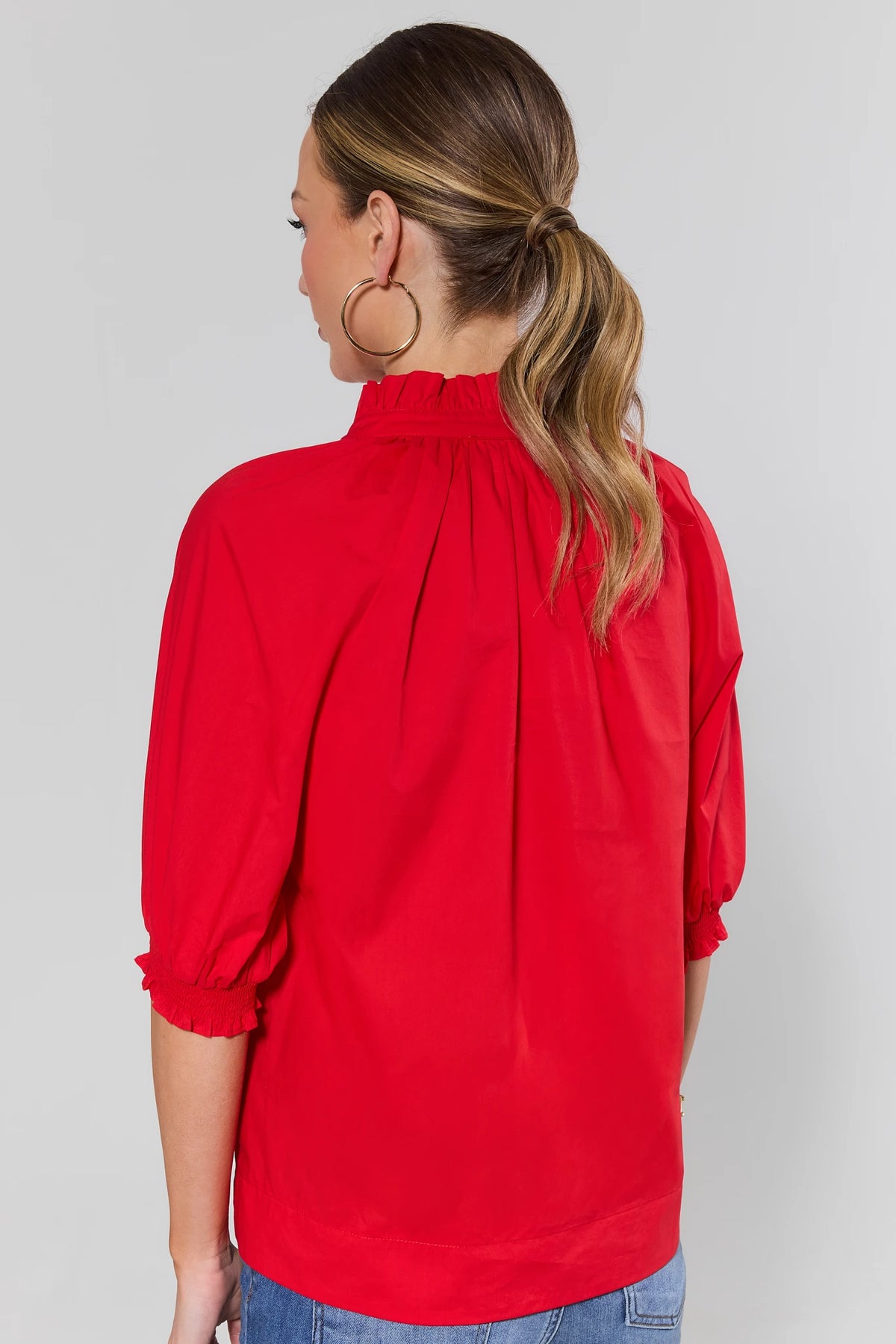 Red Merrick Split Neck Top with gathered back yoke and smocked cuffs - Back View | Avara