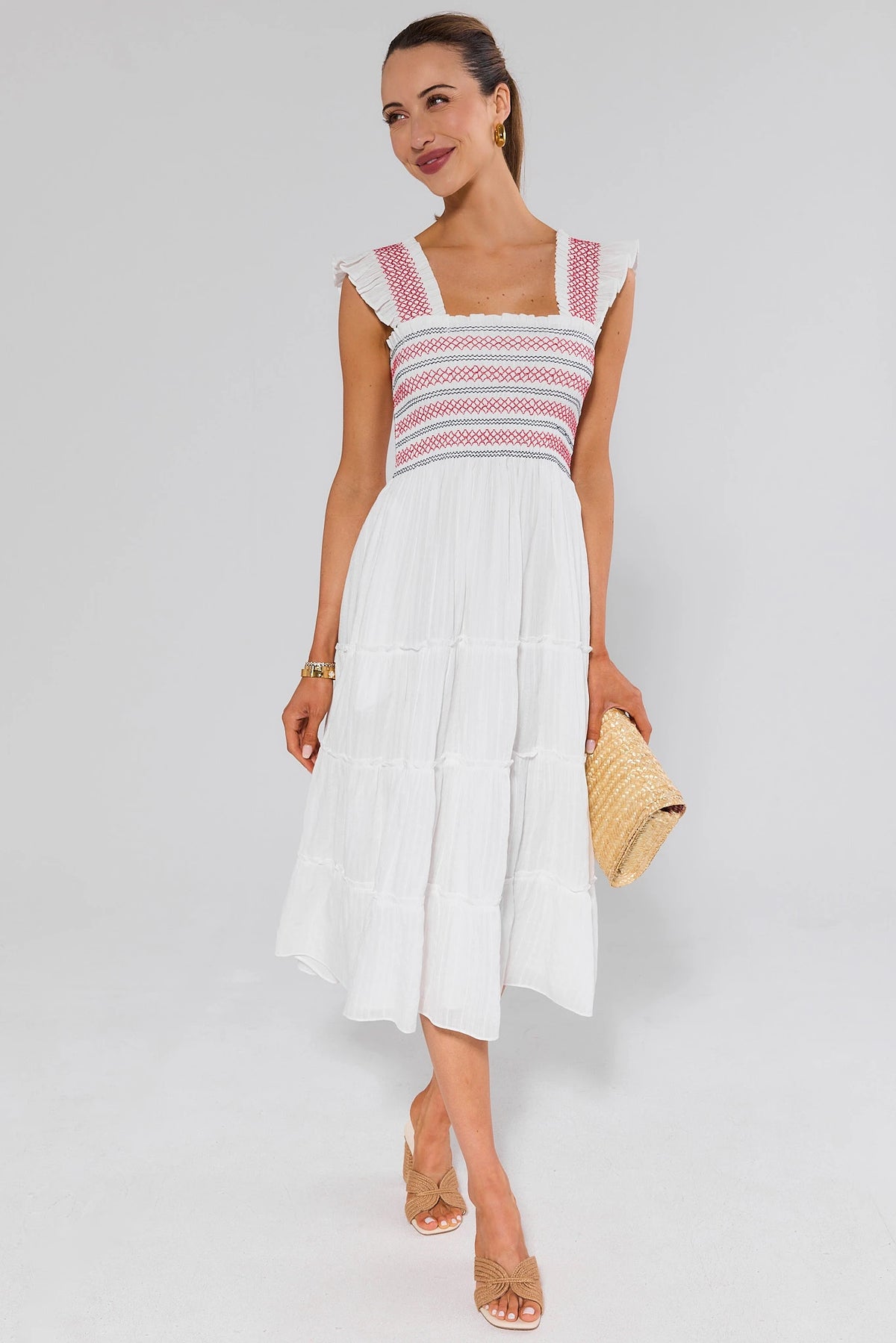 Tristan White Embroidered Midi Dress full-length styled with woven sandals and straw clutch - On Model | Avara