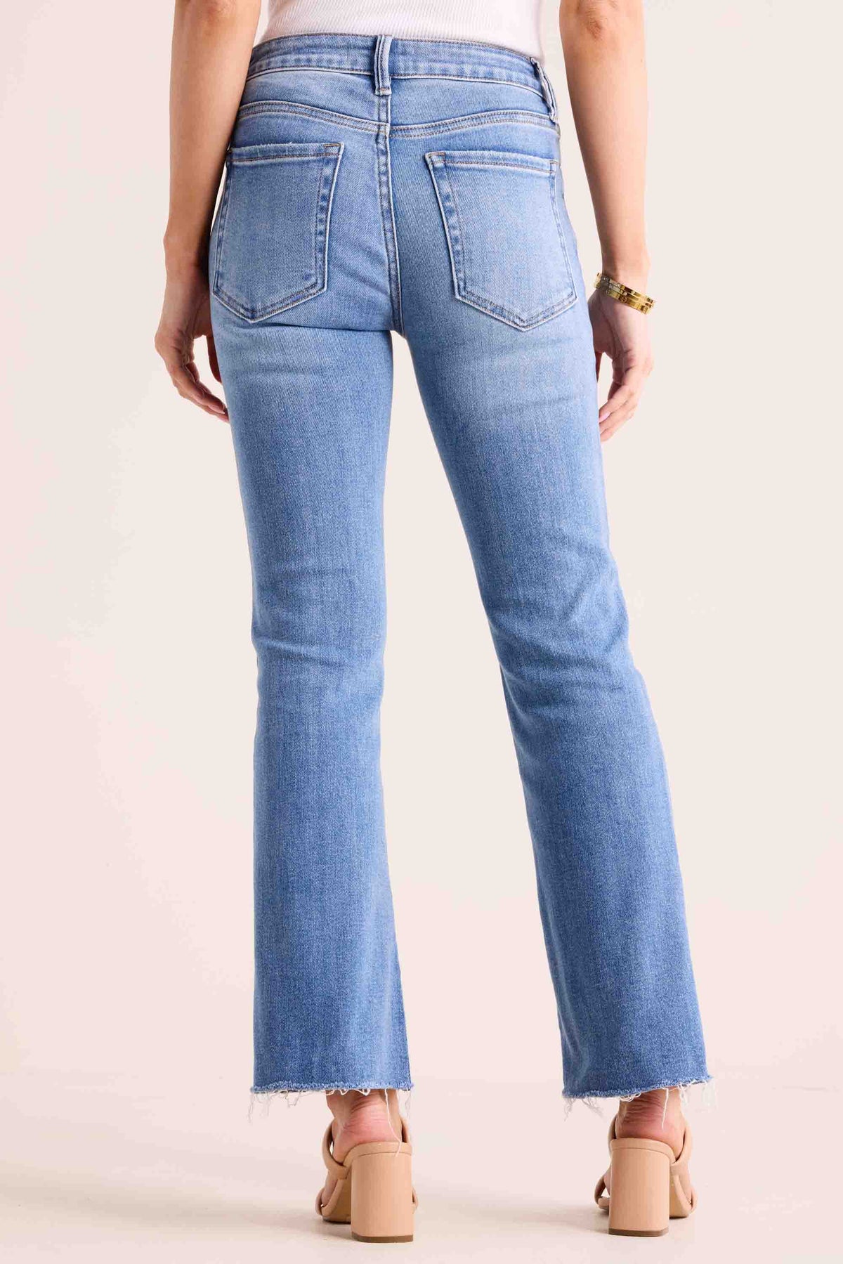 Wendy Medium Wash Kick Flare Jeans - Back View, Five-Pocket Raw-Edge Hem | Avara