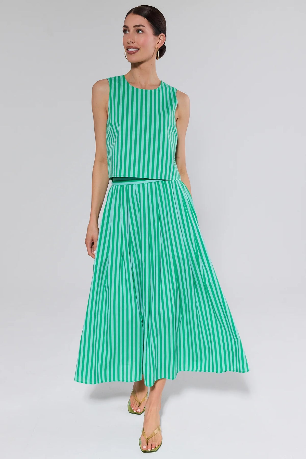 Green and white striped tank top styled as matching set with maxi skirt, full-length front view | Avara
