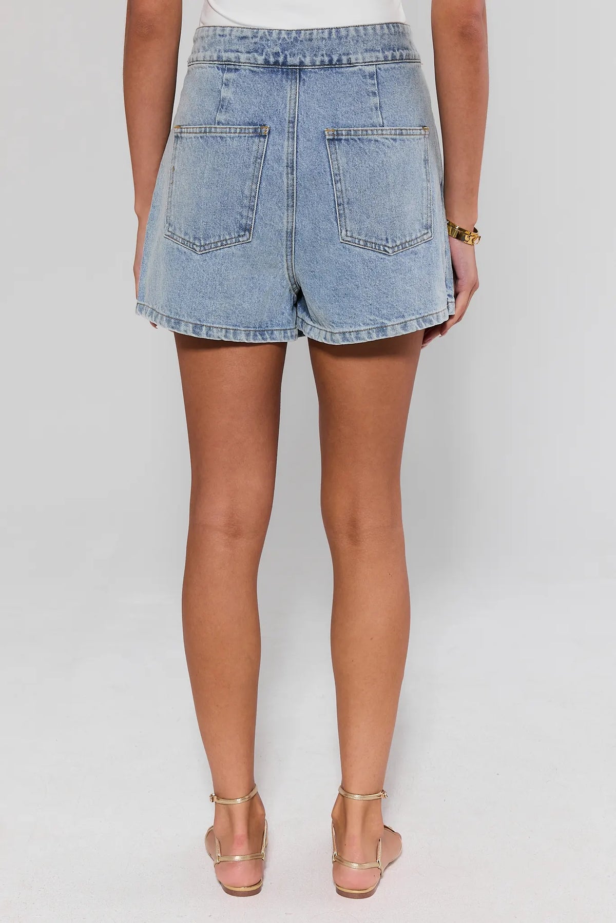 Light Blue Nikki Denim Wrap Skort - Back View Showing Shorts Silhouette & Patch Pockets | Avara