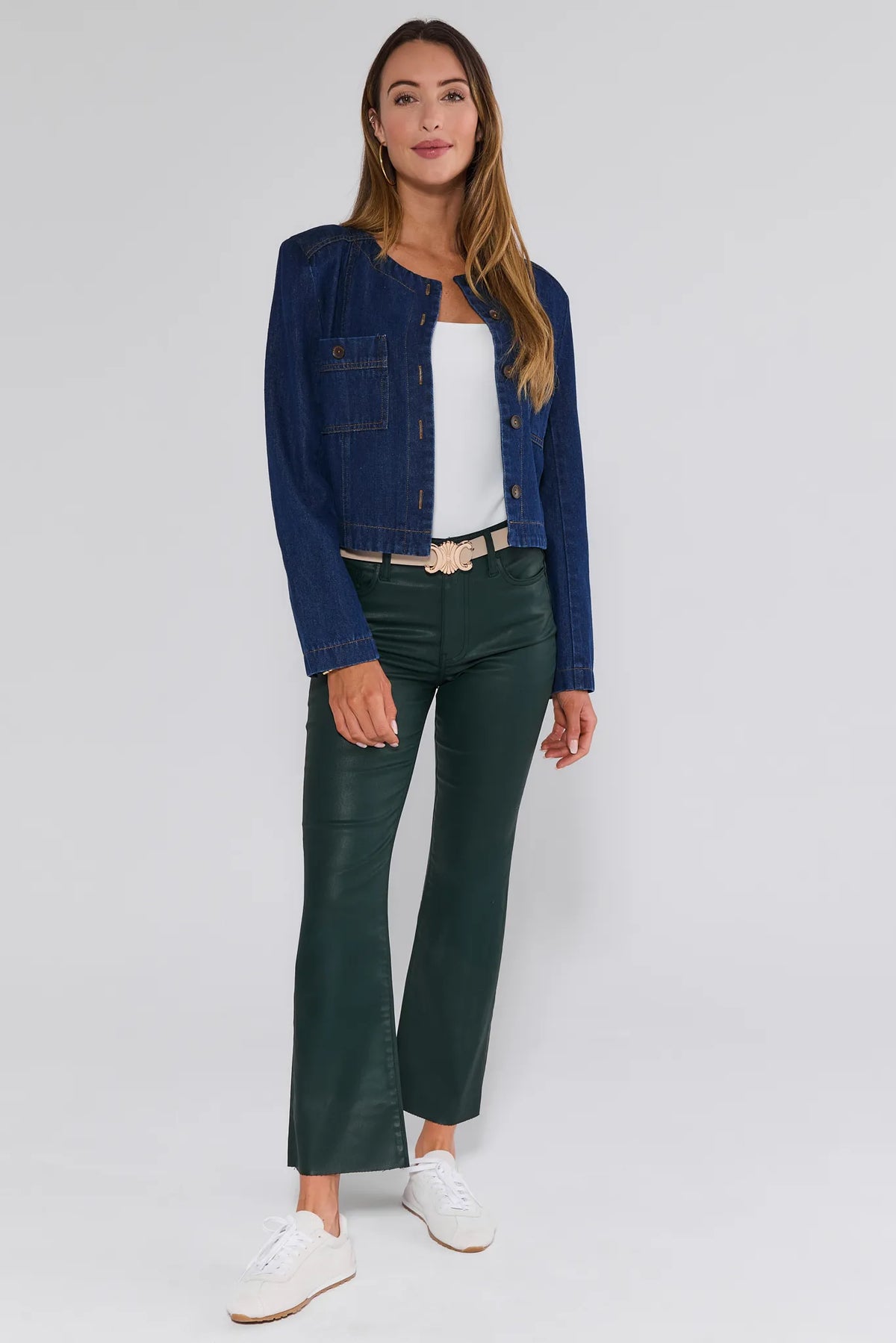 Woman styled in forest green Kelsey Wax-Coated Kick Flare Jeans with denim jacket - Full Look | Avara