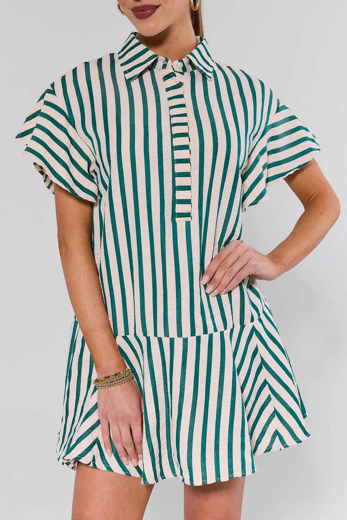 Daniella Green Striped Short Dress close-up showing tiered hem and flutter sleeve detail | Avara