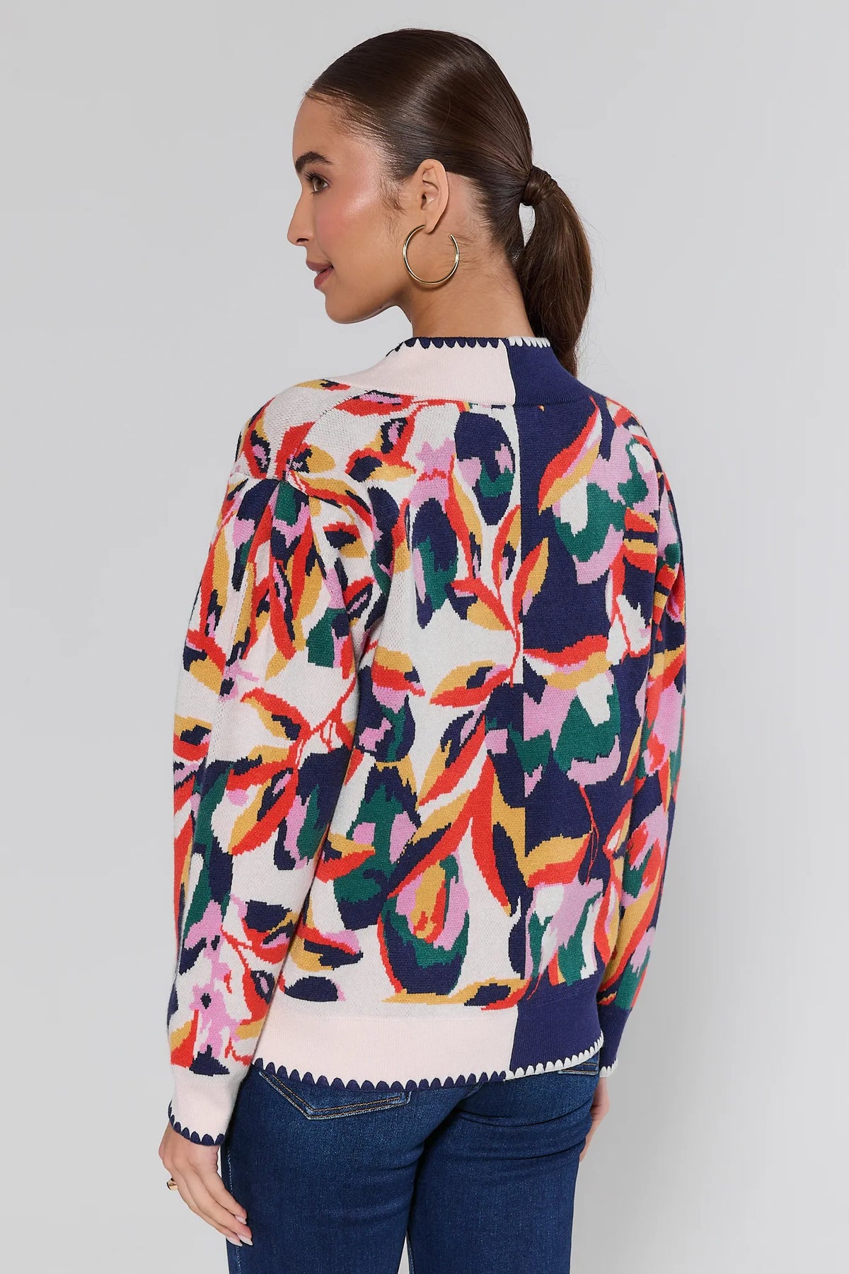 Leslie Navy Floral Cardigan back view showing allover colorful patterned knit and scalloped trim detail on women's cardigan | Avara