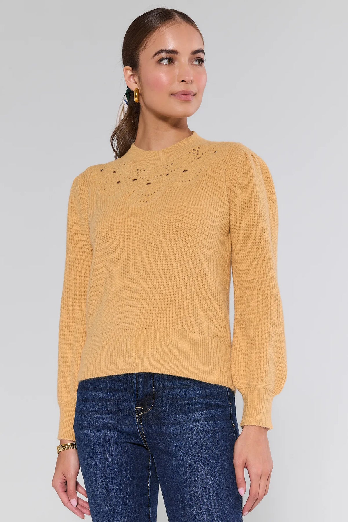 Yellow Dixie Knit Sweater with open-knit chest detail and blouson sleeves, front view on model | Avara