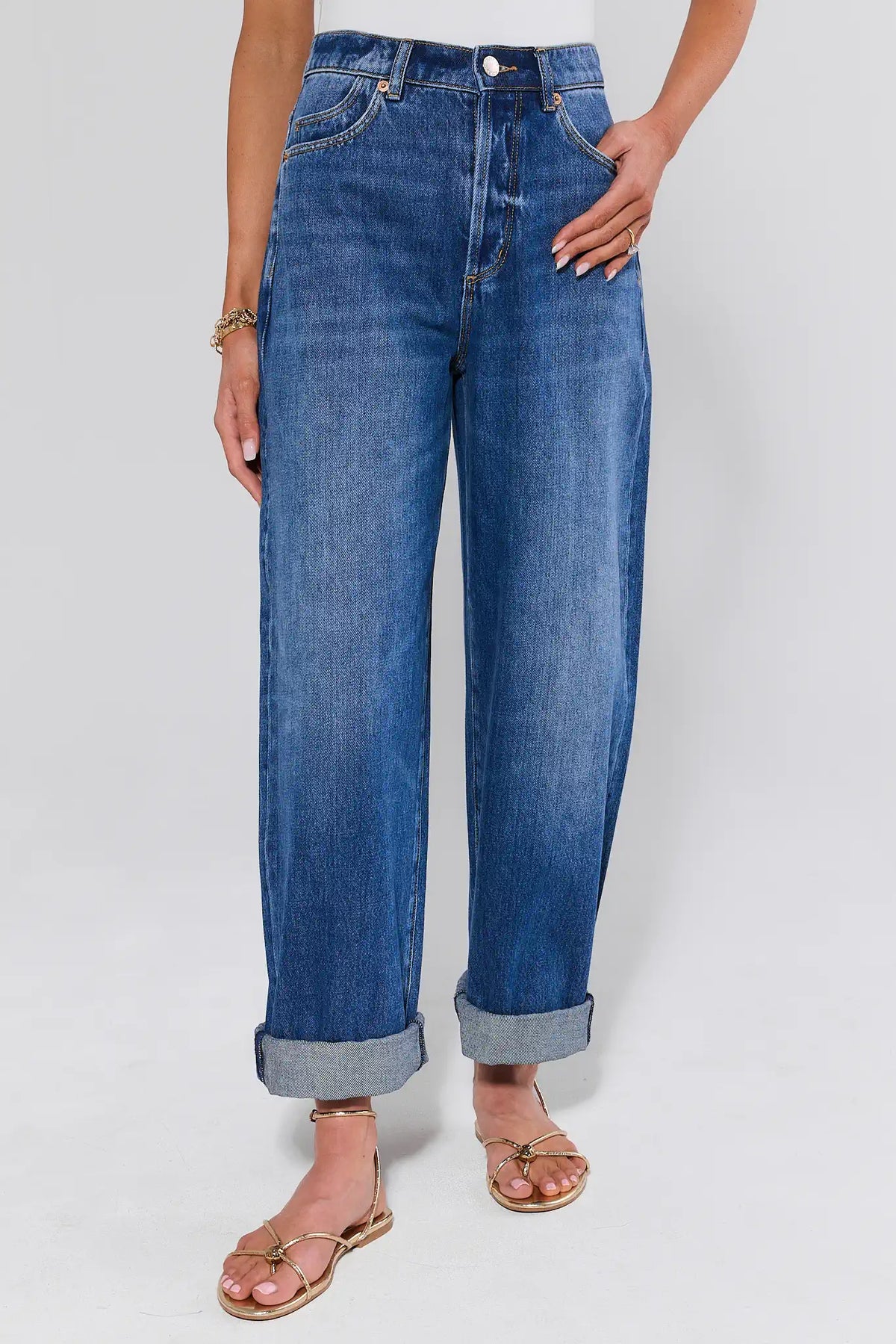 Rolla's Gigi Dark Wash Barrel Jeans - Front View with Rolled Hem, Gold Sandals | Avara