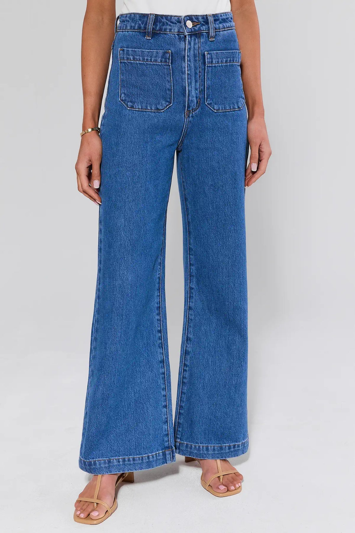 Rolla's Sailor Medium Wash Flare Jeans - Front View, High-Rise Patch Pockets | Avara