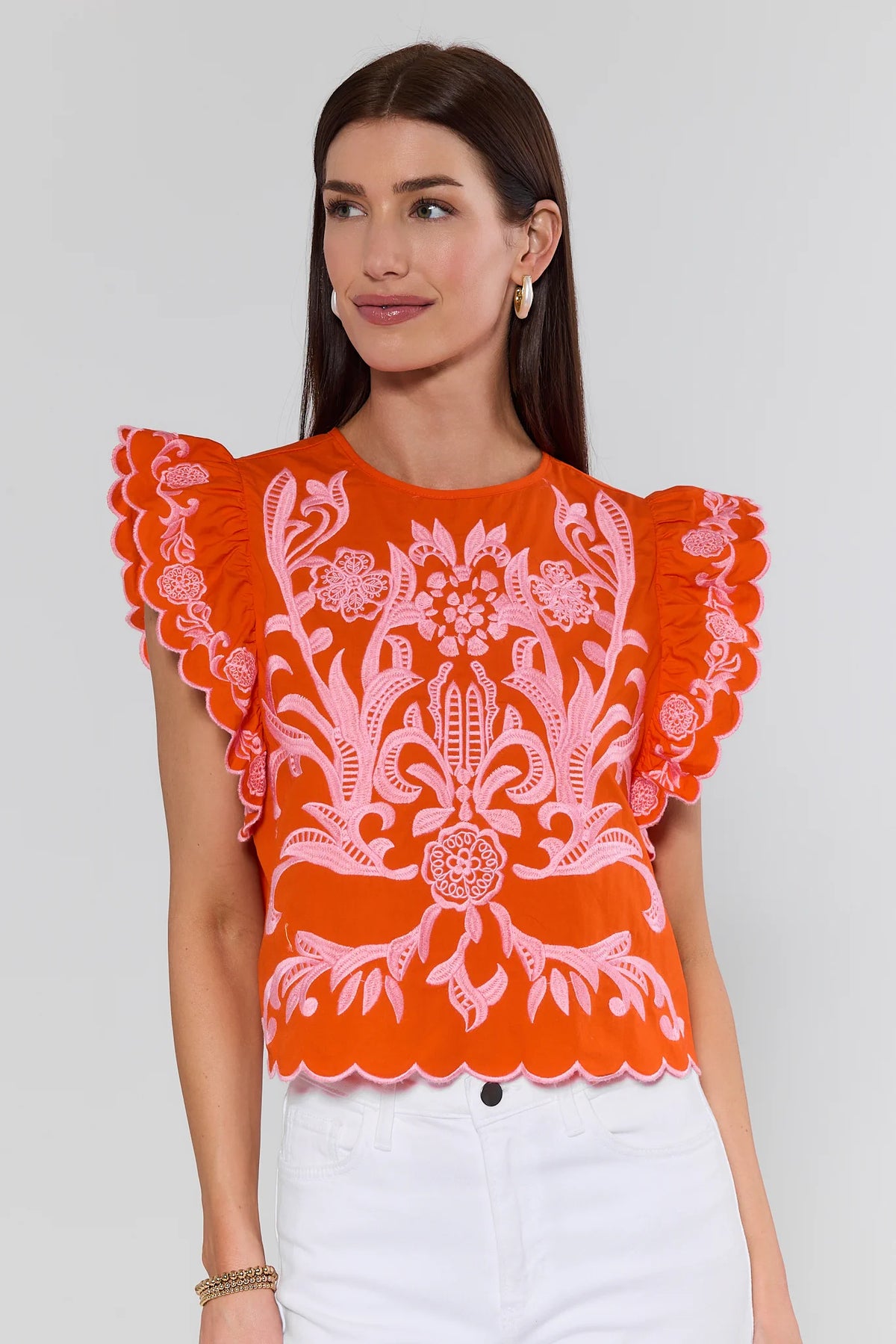 Bradley Orange Embroidered Top by THML with pink floral detailing and ruffle sleeves - Front View | Avara