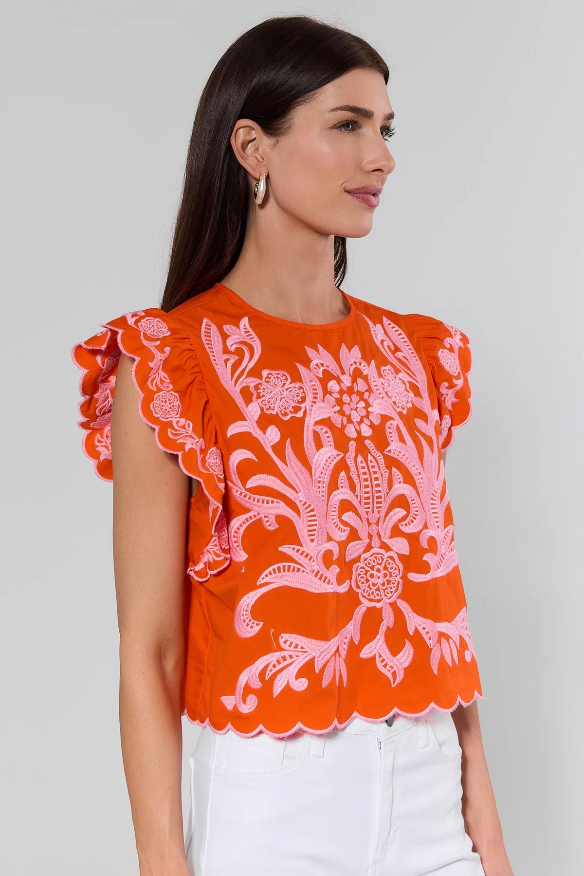 Bradley Orange Embroidered Top by THML showing back keyhole and embroidered ruffle sleeves - Side View | Avara