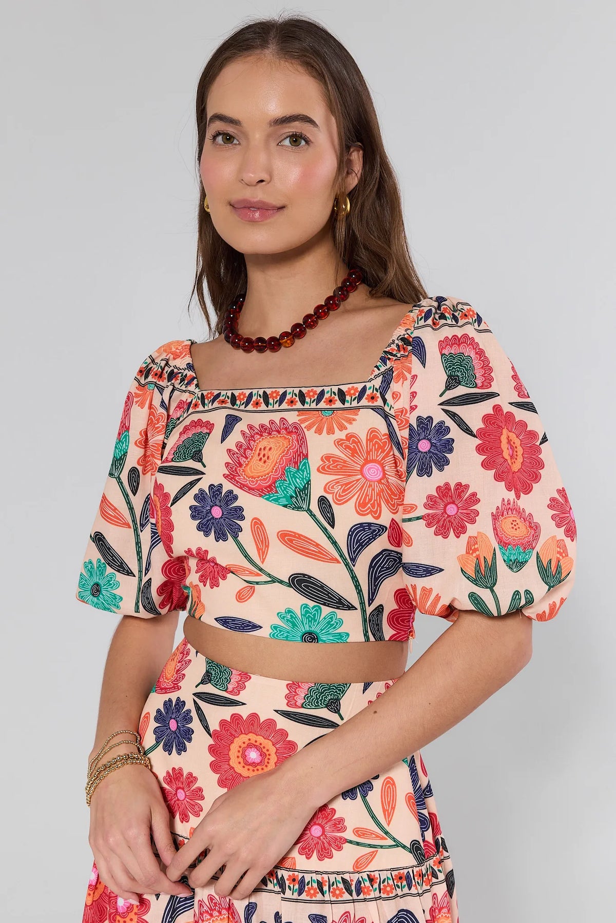 Serena Orange Floral Printed Crop Top - Square Neck Front View, Puff Sleeves | Avara