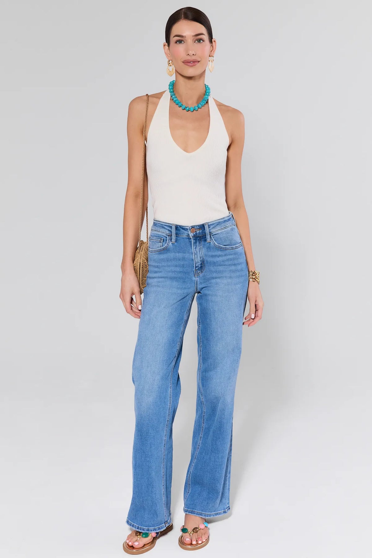 Meg Ivory Knit Halter Top styled with wide-leg jeans, turquoise necklace, and sandals - Full Length Look | Avara