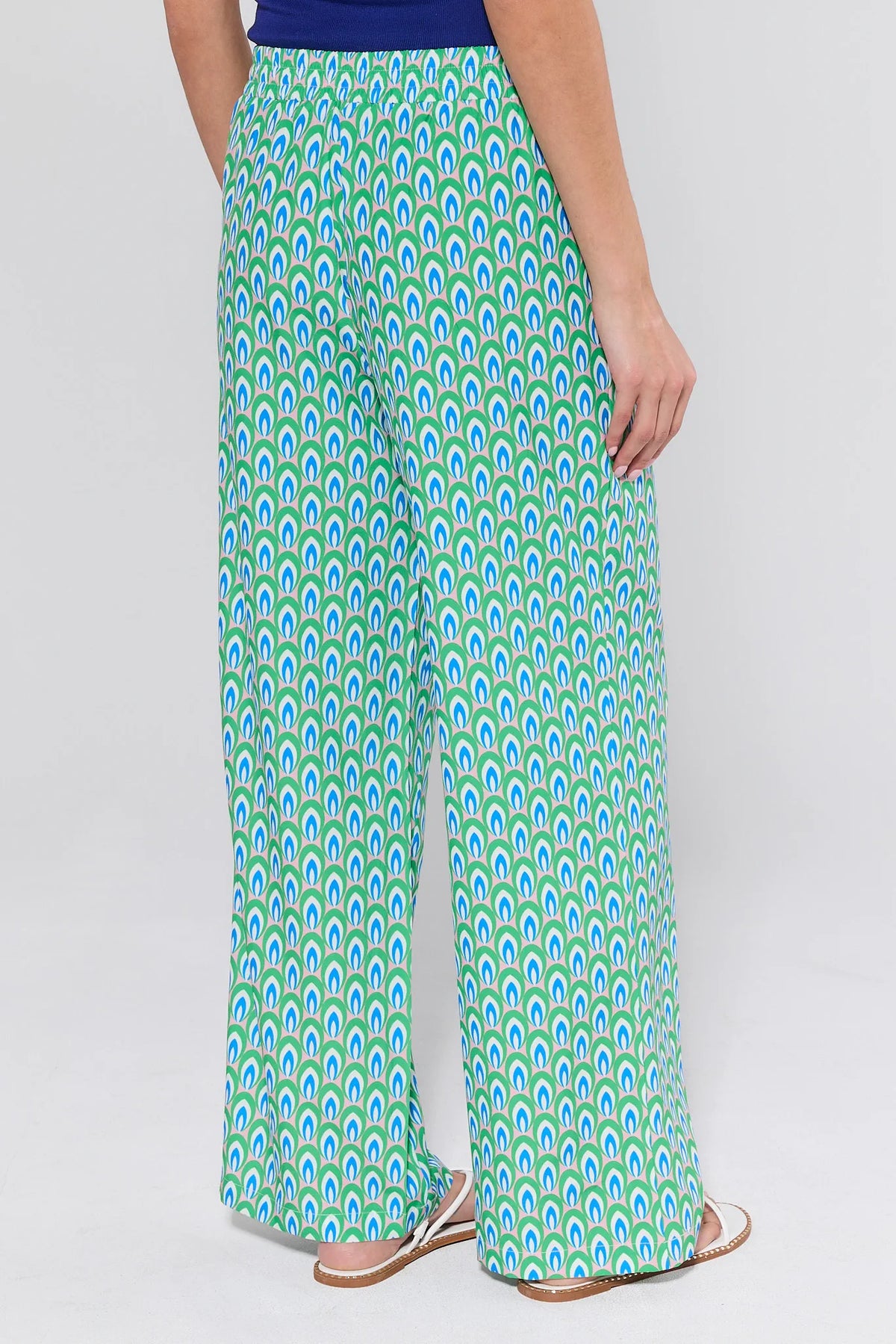 Avery Printed Wide Leg Pants in green & blue peacock print, elastic waist, flared wide leg - Back View | Avara