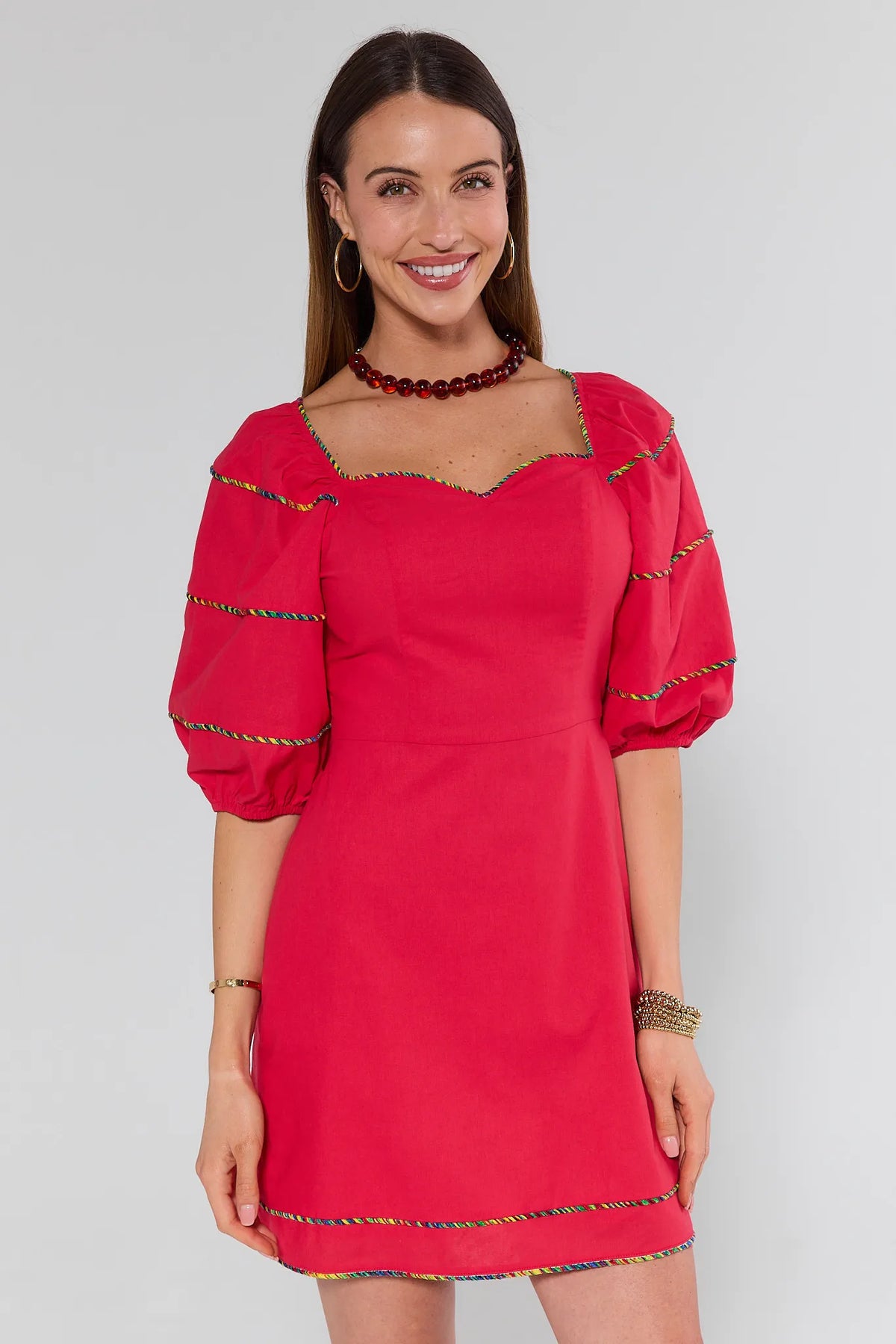 Red puff sleeve short dress with multicolor contrast trim and sweetheart neckline - Front View | Avara