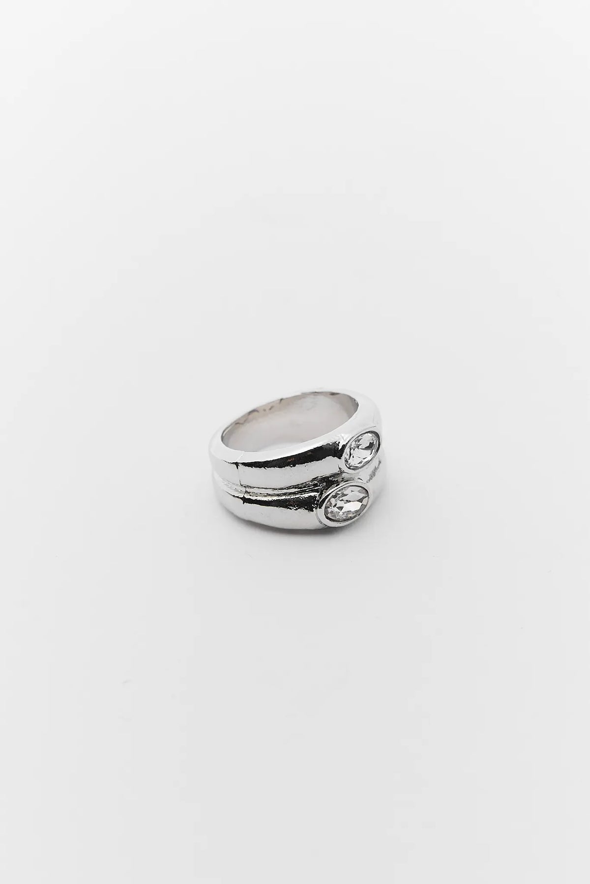Nelly Silver Rhinestone Ring showing dual oval crystal bezel detail, angled side view | Avara
