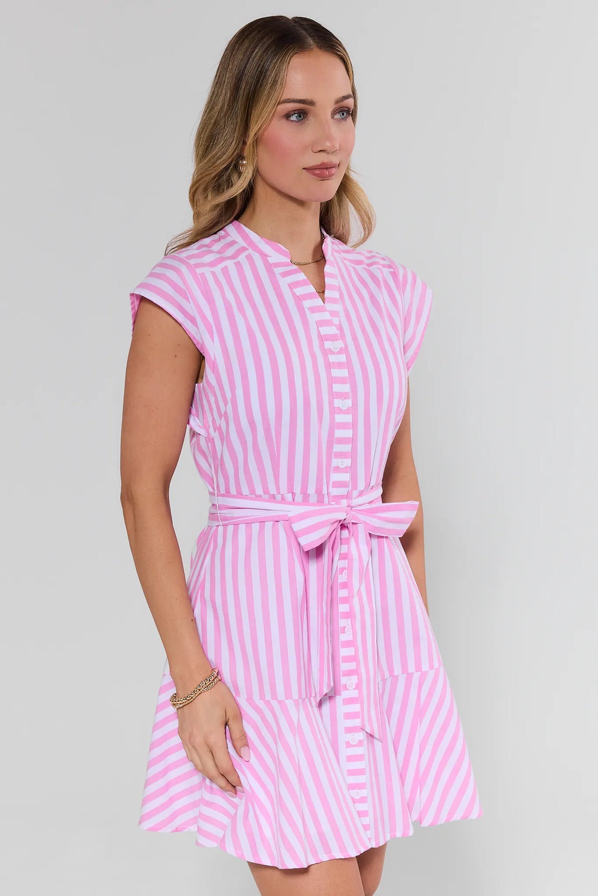 Pink and white striped Erica Short Dress with tiered skirt and cap sleeves - Side View | Avara