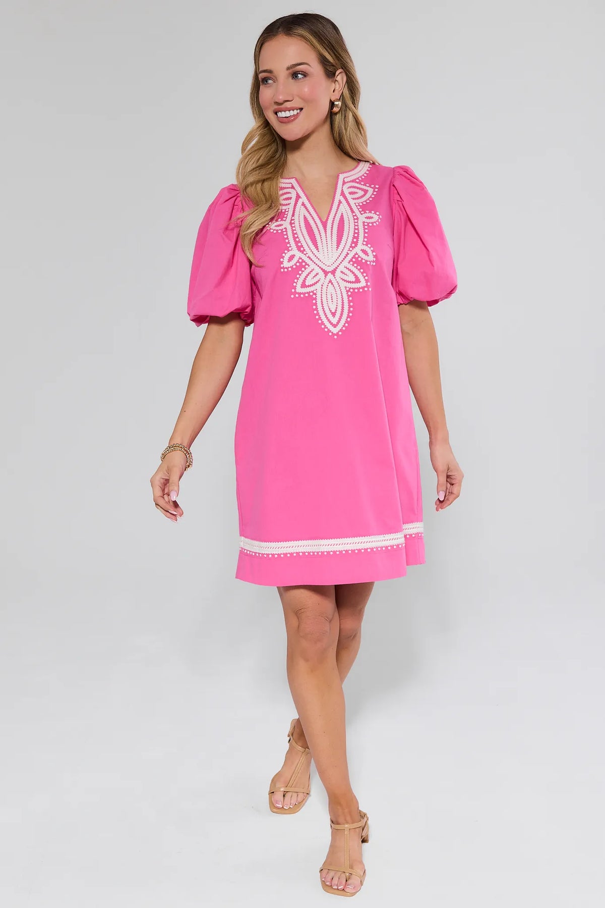 Roxanne Pink Embroidered Short Dress with puff sleeves styled with tan sandals - Full Length View | Avara
