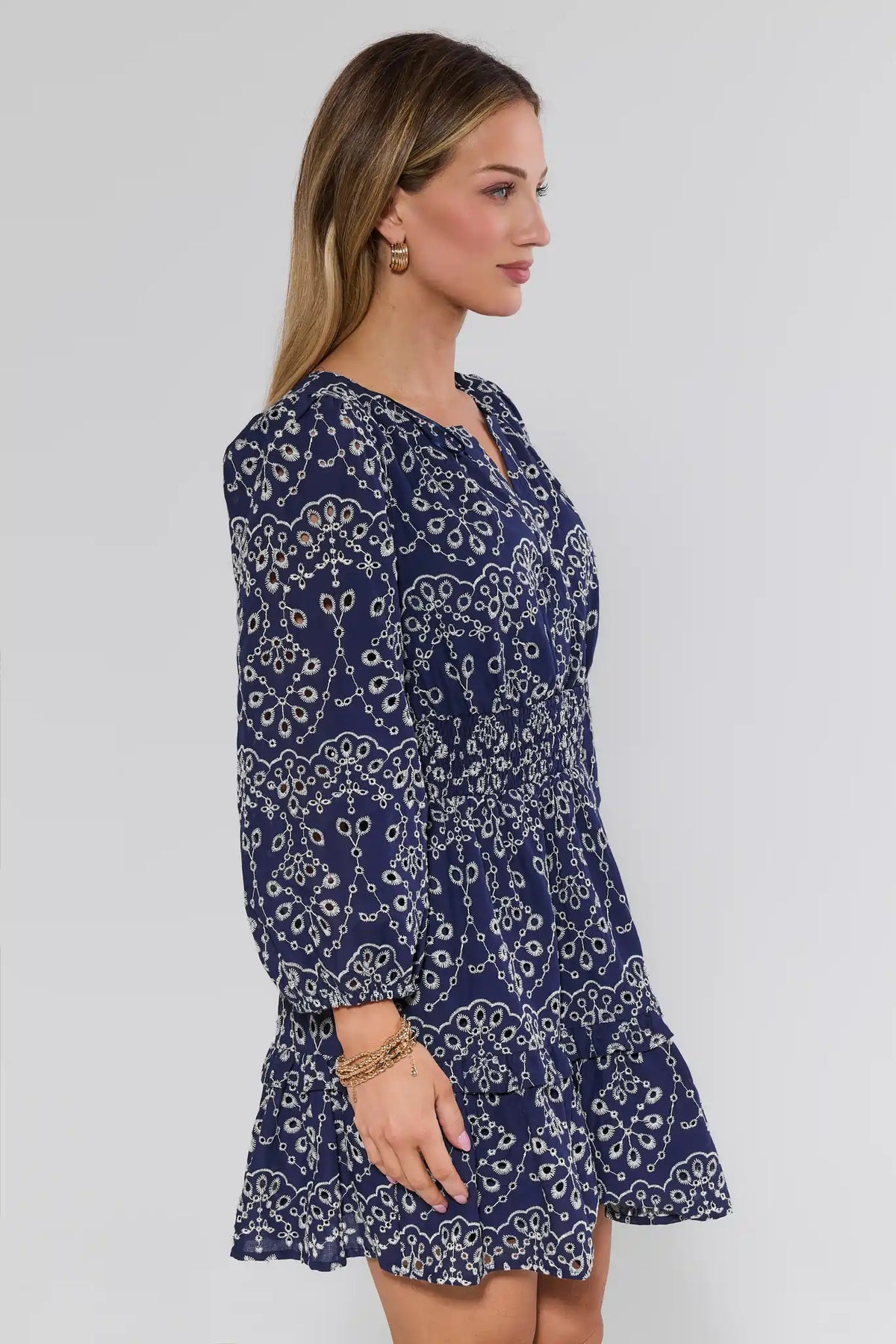 Emmie Navy Eyelet Embroidered Short Dress - Side Profile View, Smocked Waist Detail | Avara