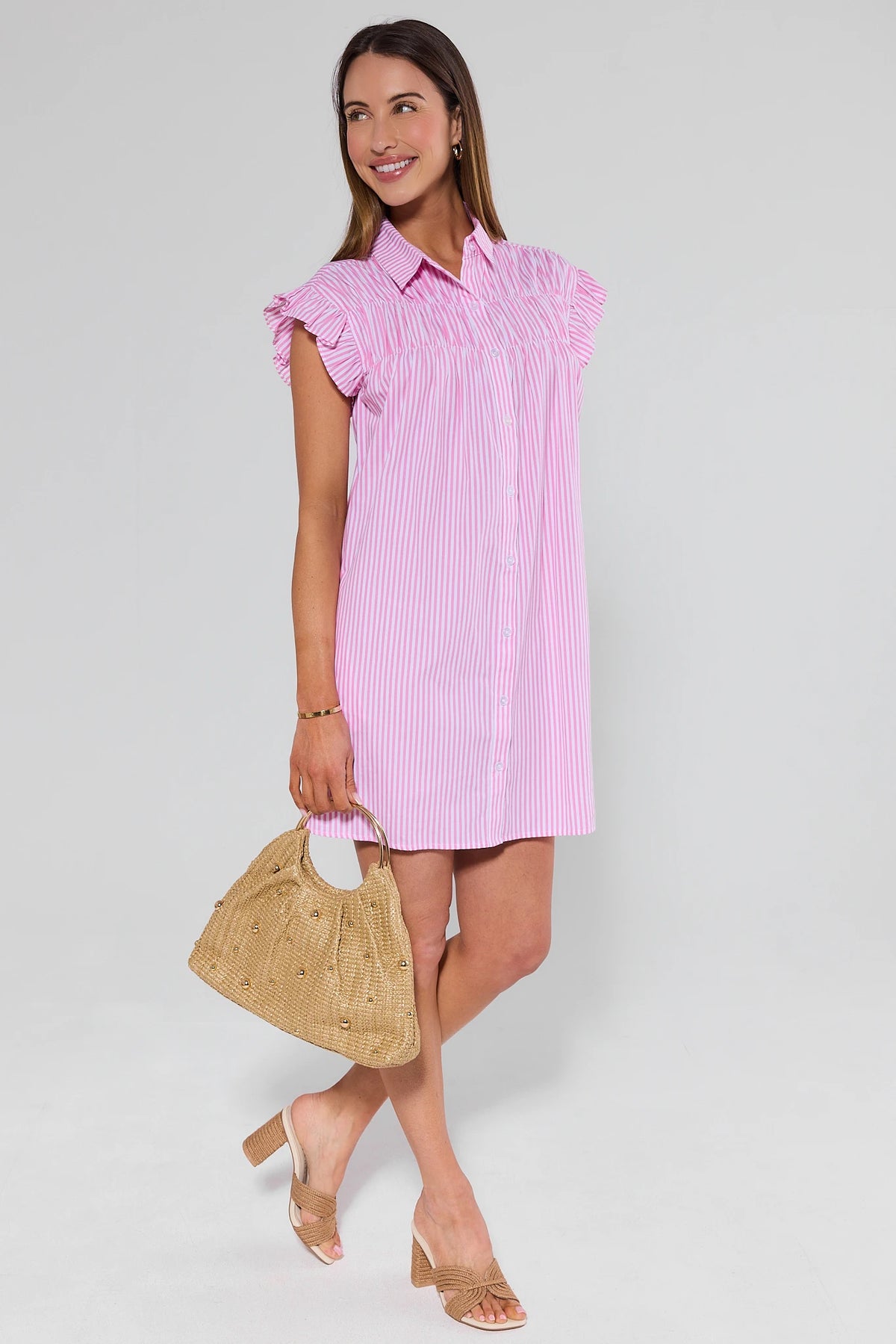 Neacie Pink Striped Short Dress styled with woven bag and block heels, full-length side view | Avara