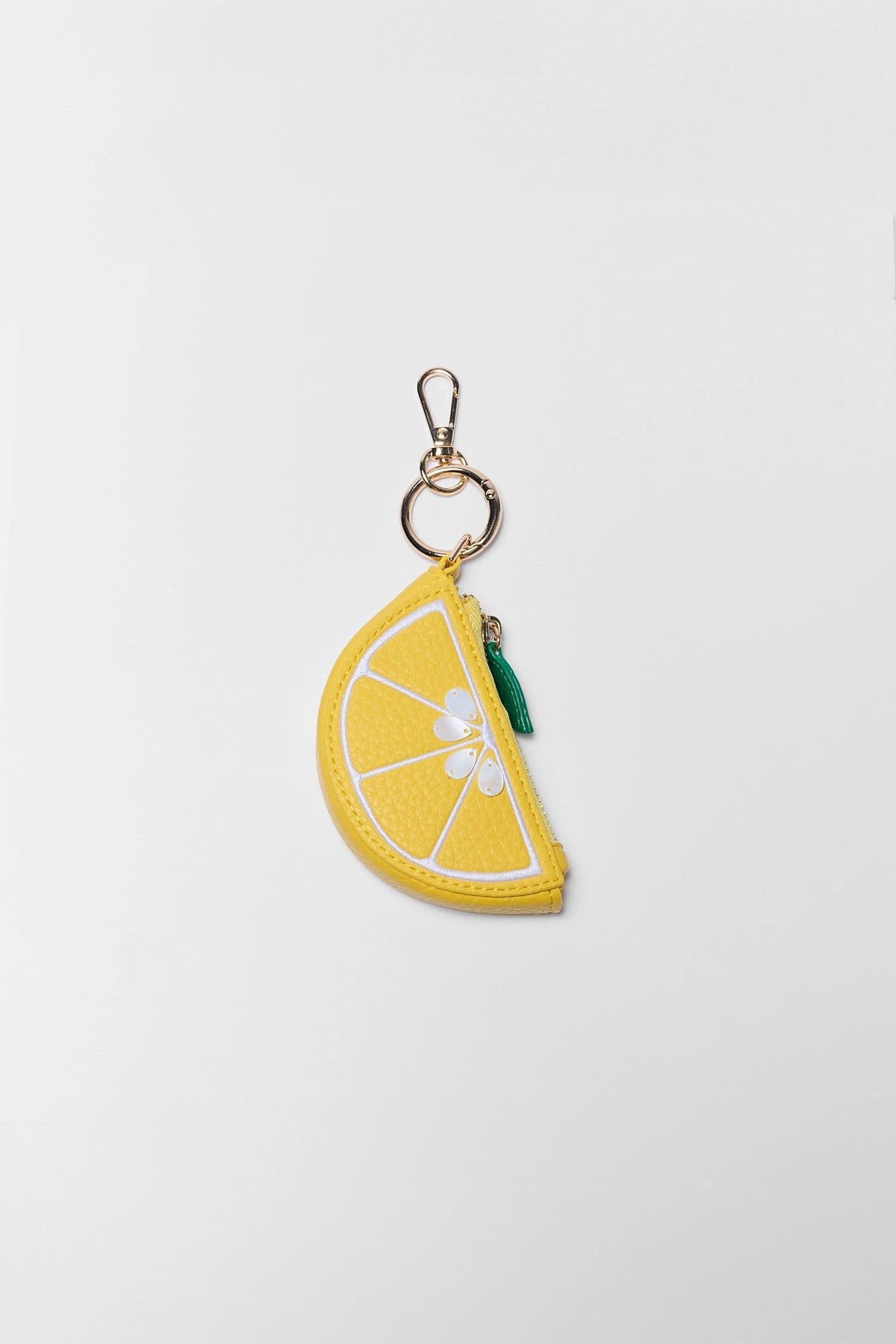 Yellow Faux Leather Lemon Slice Bag Charm with Gold-Tone Clip - Flat Lay | Avara