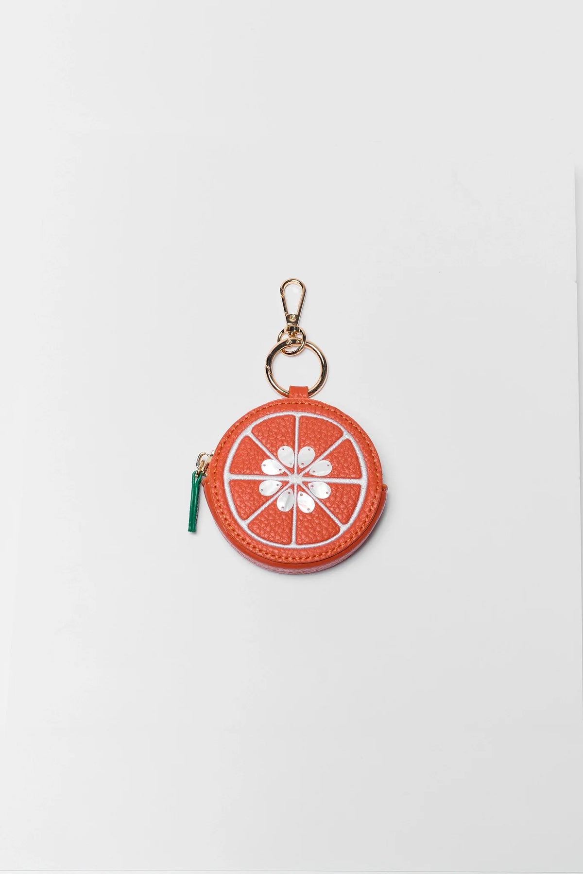 Orange Faux Leather Orange Slice Bag Charm with Gold Clip - Flat Lay | Avara