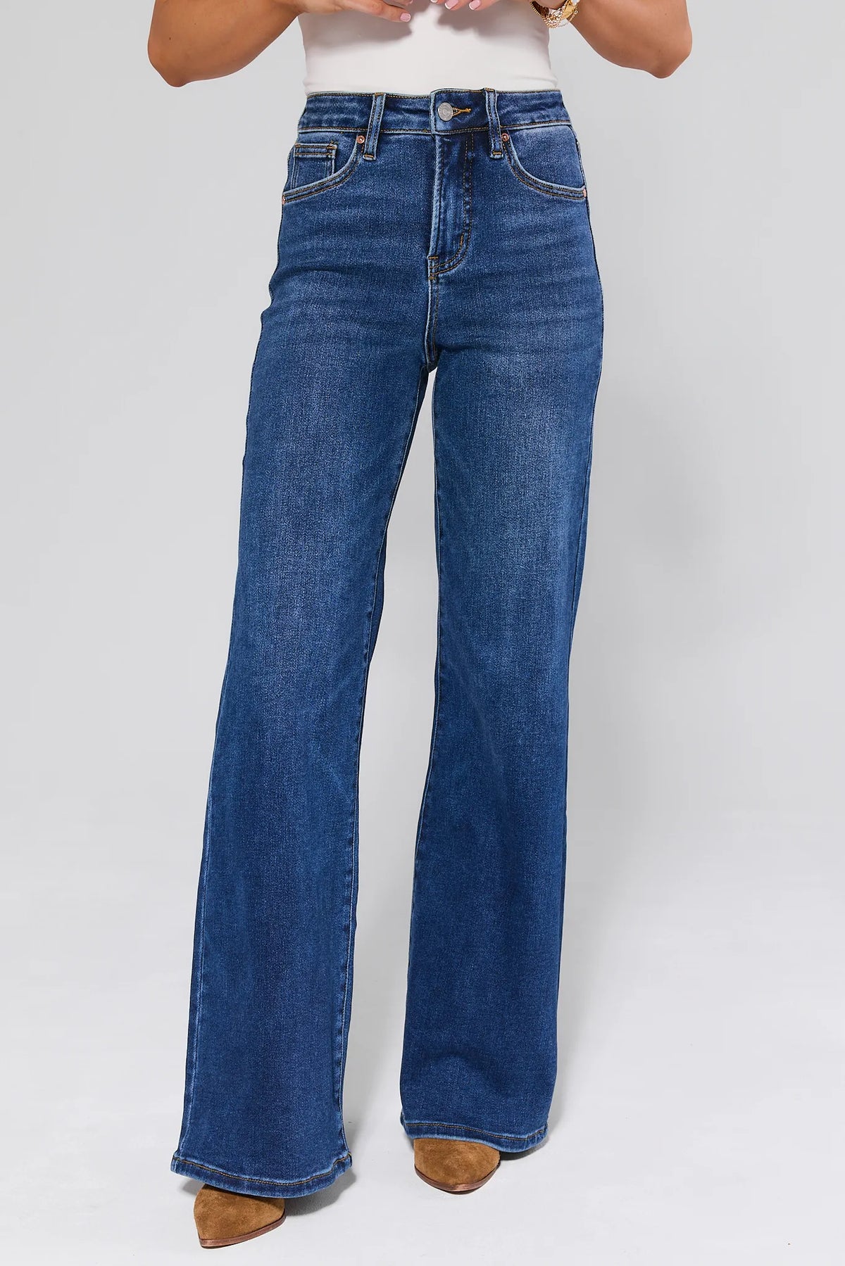 Linda Dark Wash High Rise Flare Jeans - Front View On Model | Avara