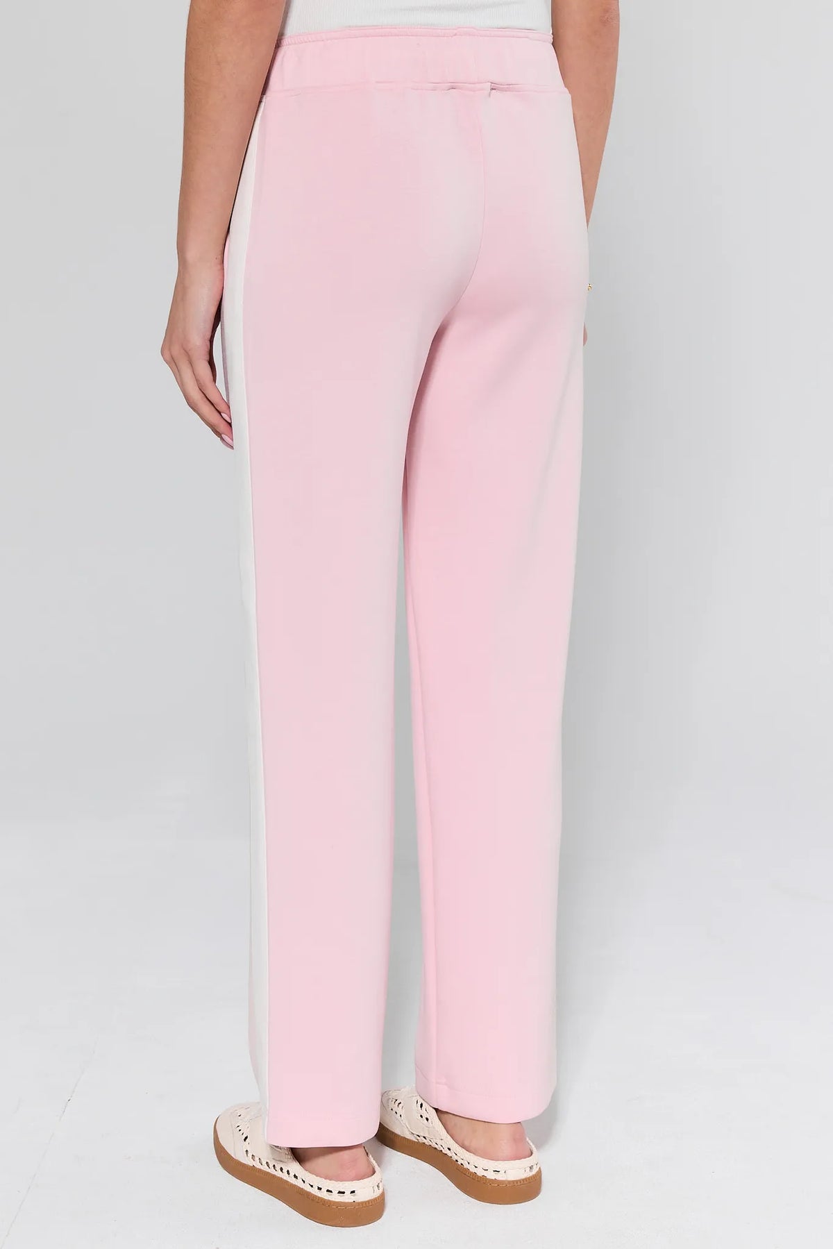 Katelyn Pink Stripe Lounge Pants with cream side stripe and elastic waistband - Back View On Model | Avara