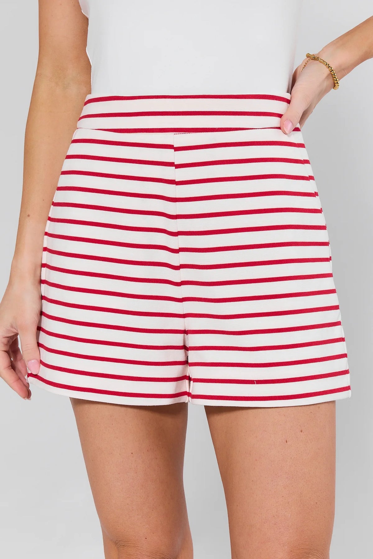 Red and white striped shorts, high-waist close-up front detail - Pippa Striped Shorts | Avara