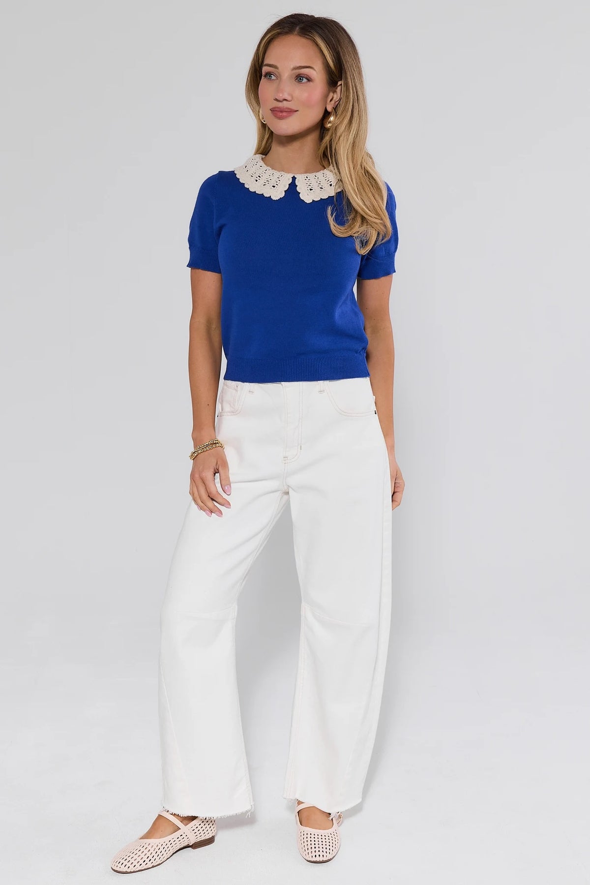 Addison Blue Knit Short Sleeve Top styled with white wide-leg jeans - Full Length View | Avara